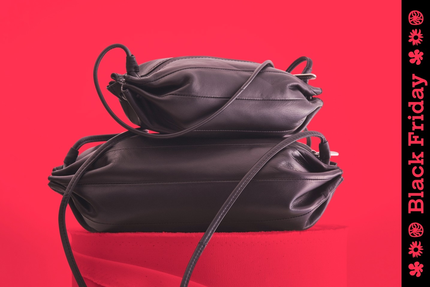 Karla bags on a red background with Black Friday text on the side.