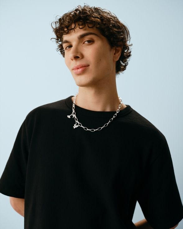 Model wearing a Kalevala x Marimekko Garden necklace.