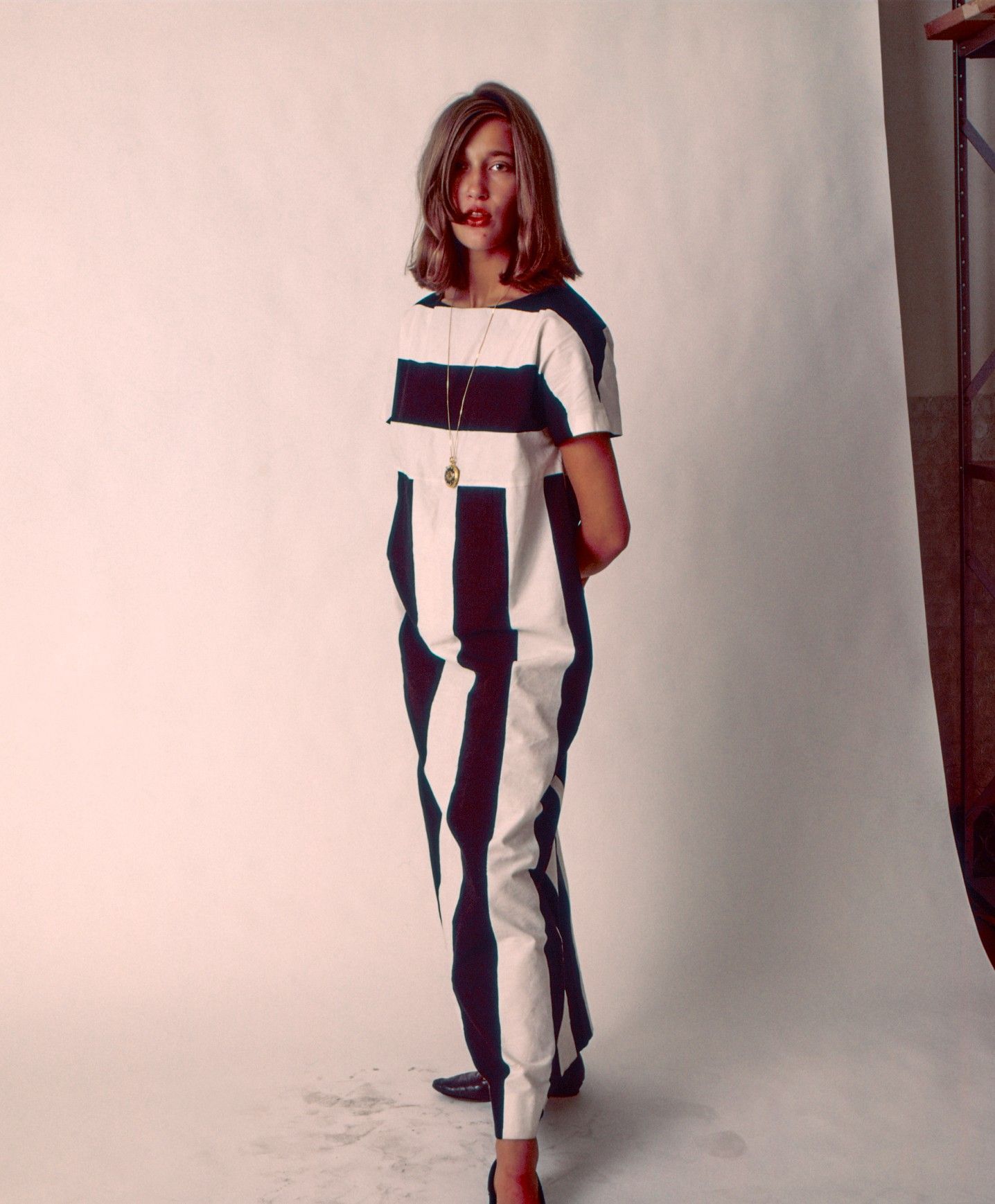 Photo by Tony Vaccaro of a model wearing Marimekko clothing with black and white stripes.