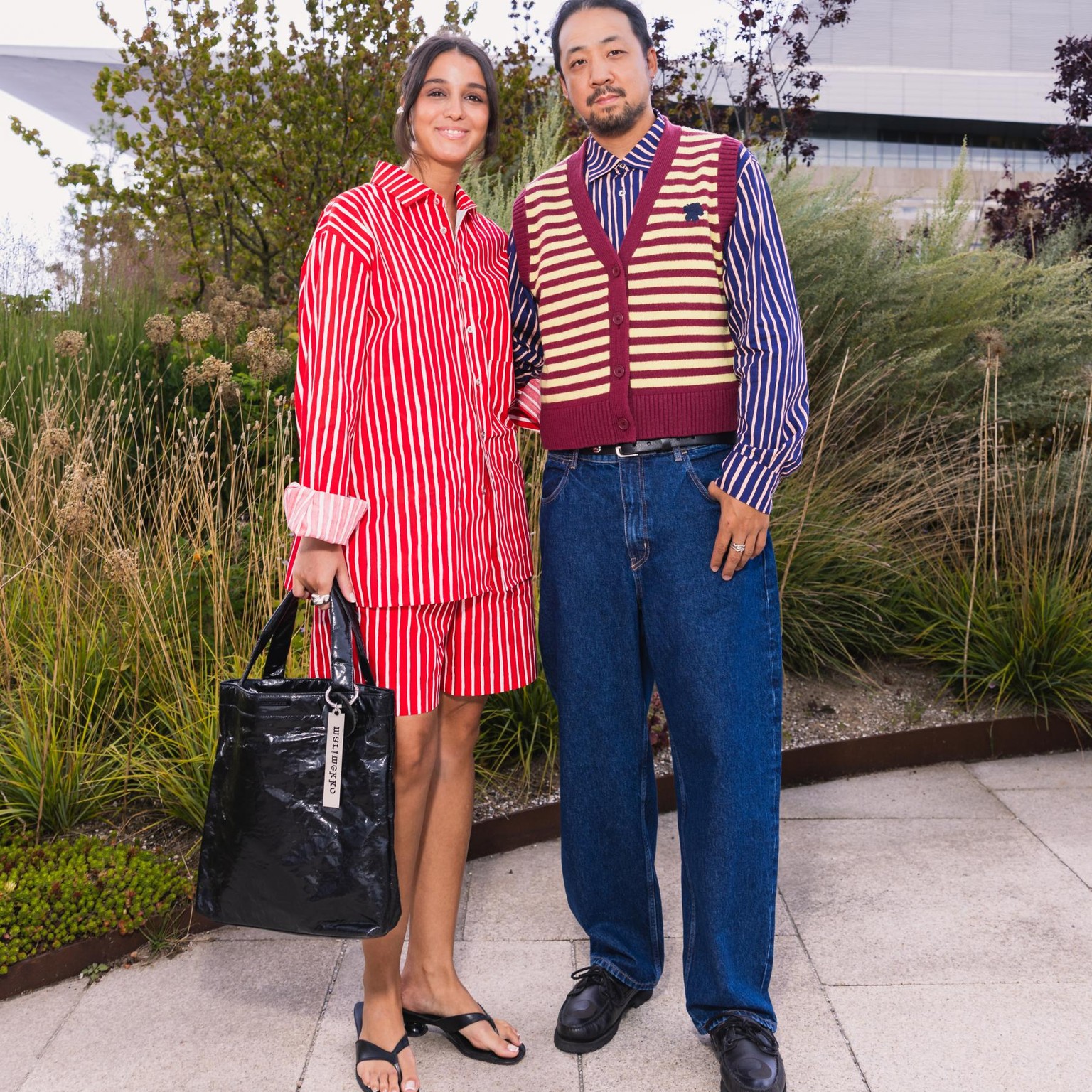 Simay Demirel and Julien Pham wearing Jokapoika style. Accessorised with Resonance bag.