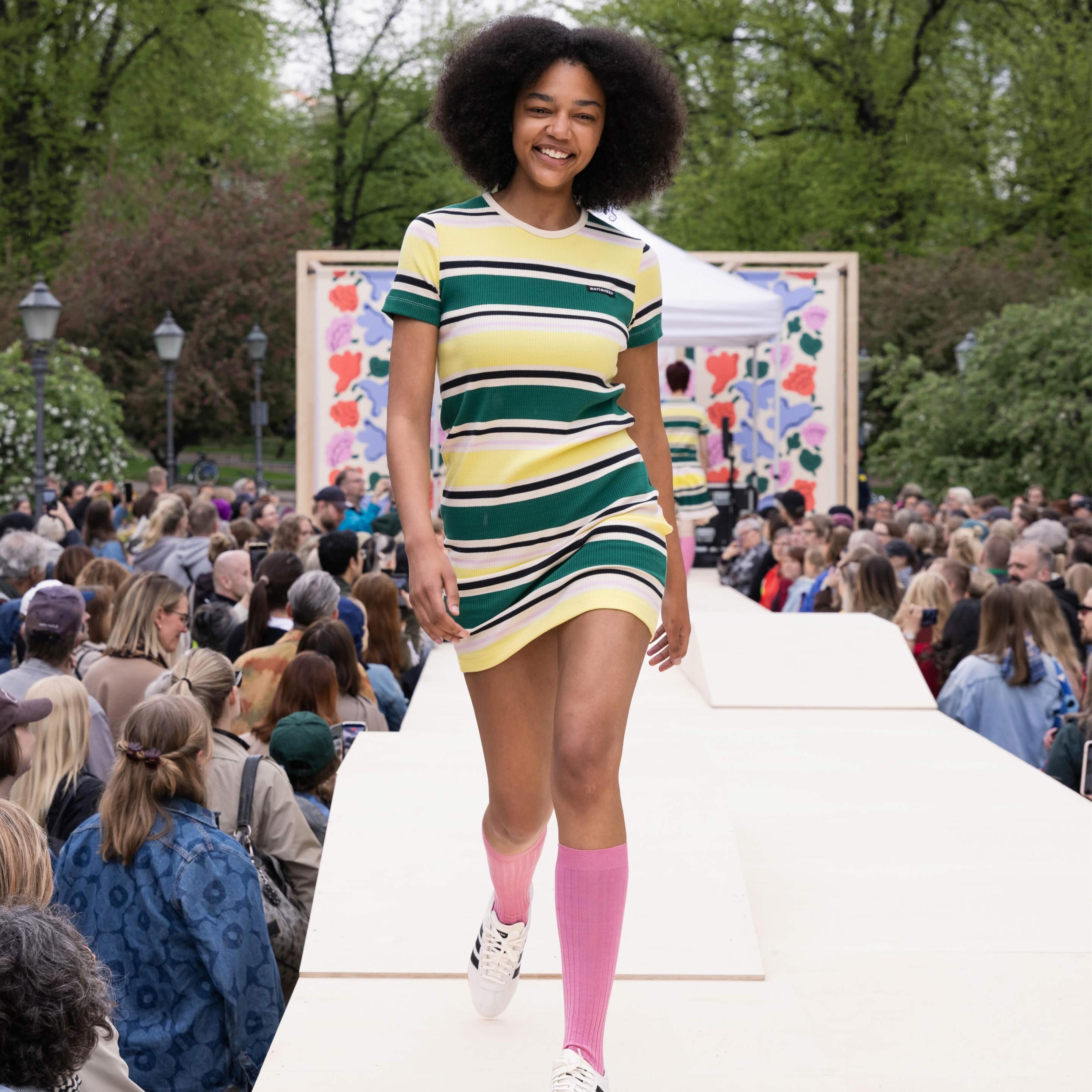 The Marimekko Day model walks on stage