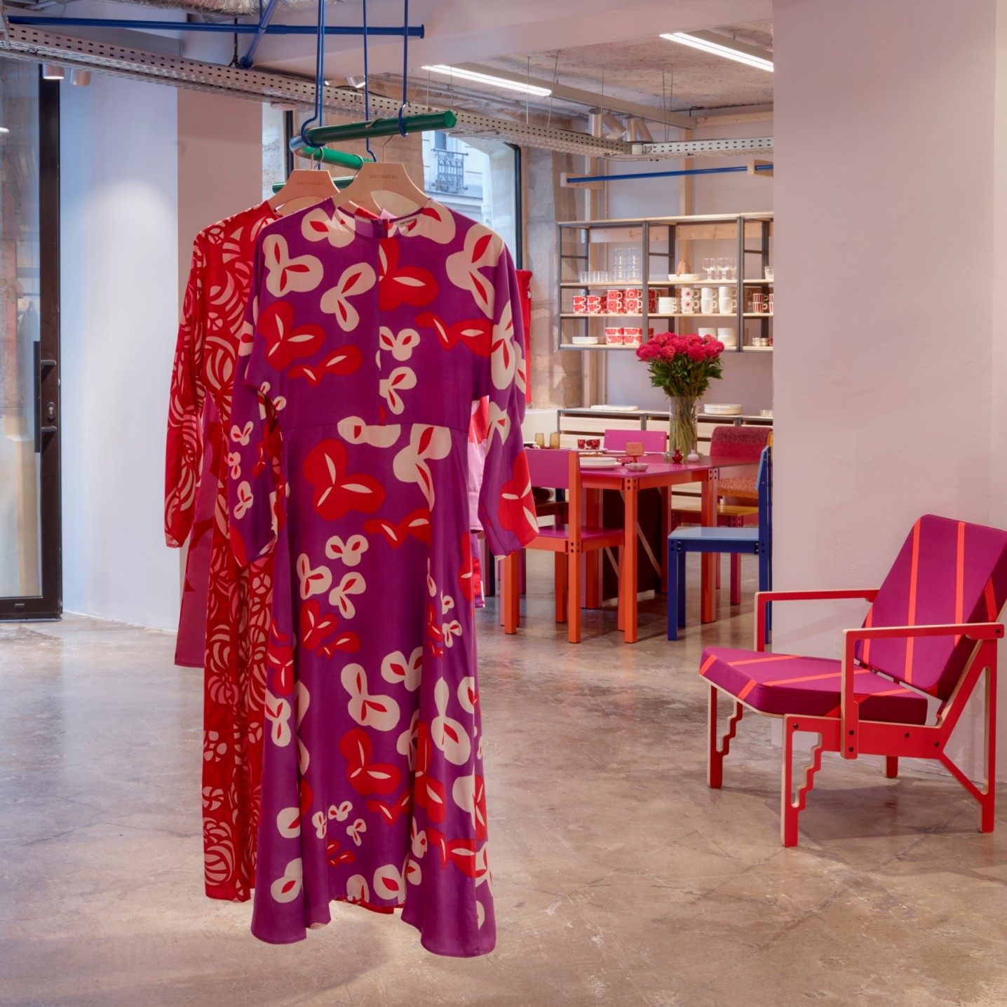 Dresses on hangers in the Marimekko Paris store.