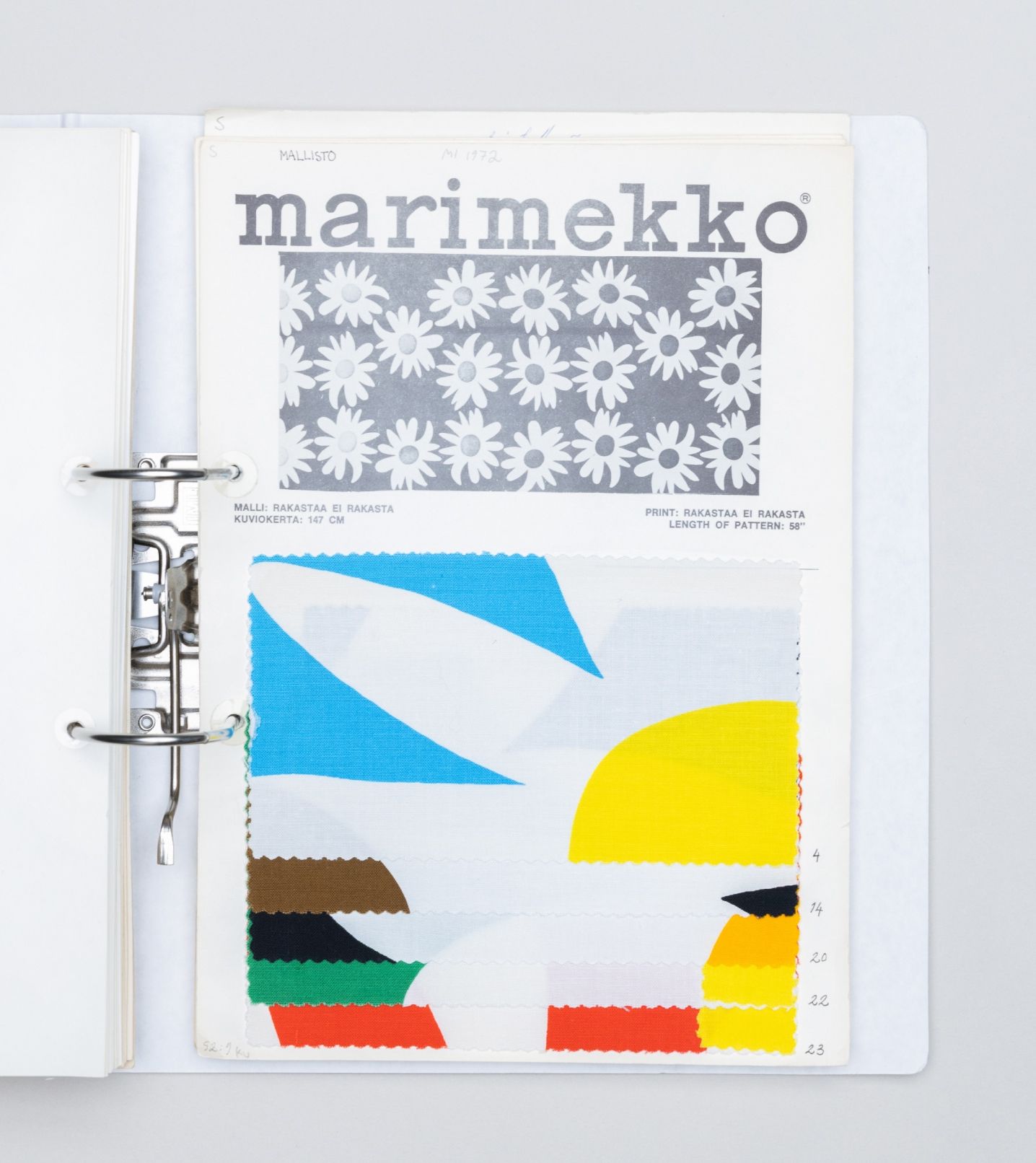 Folder with patched of colorful flower fabric.