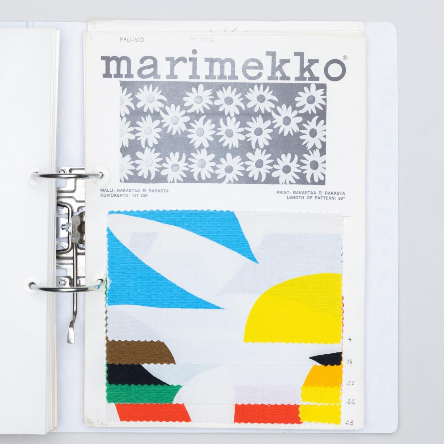 Folder with patched of colorful flower fabric.