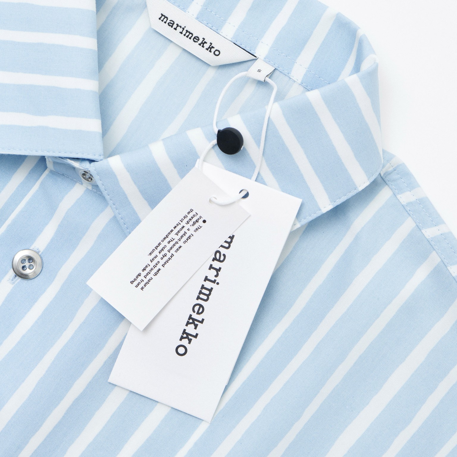 New Jokapoika shirt with material and price tag on.