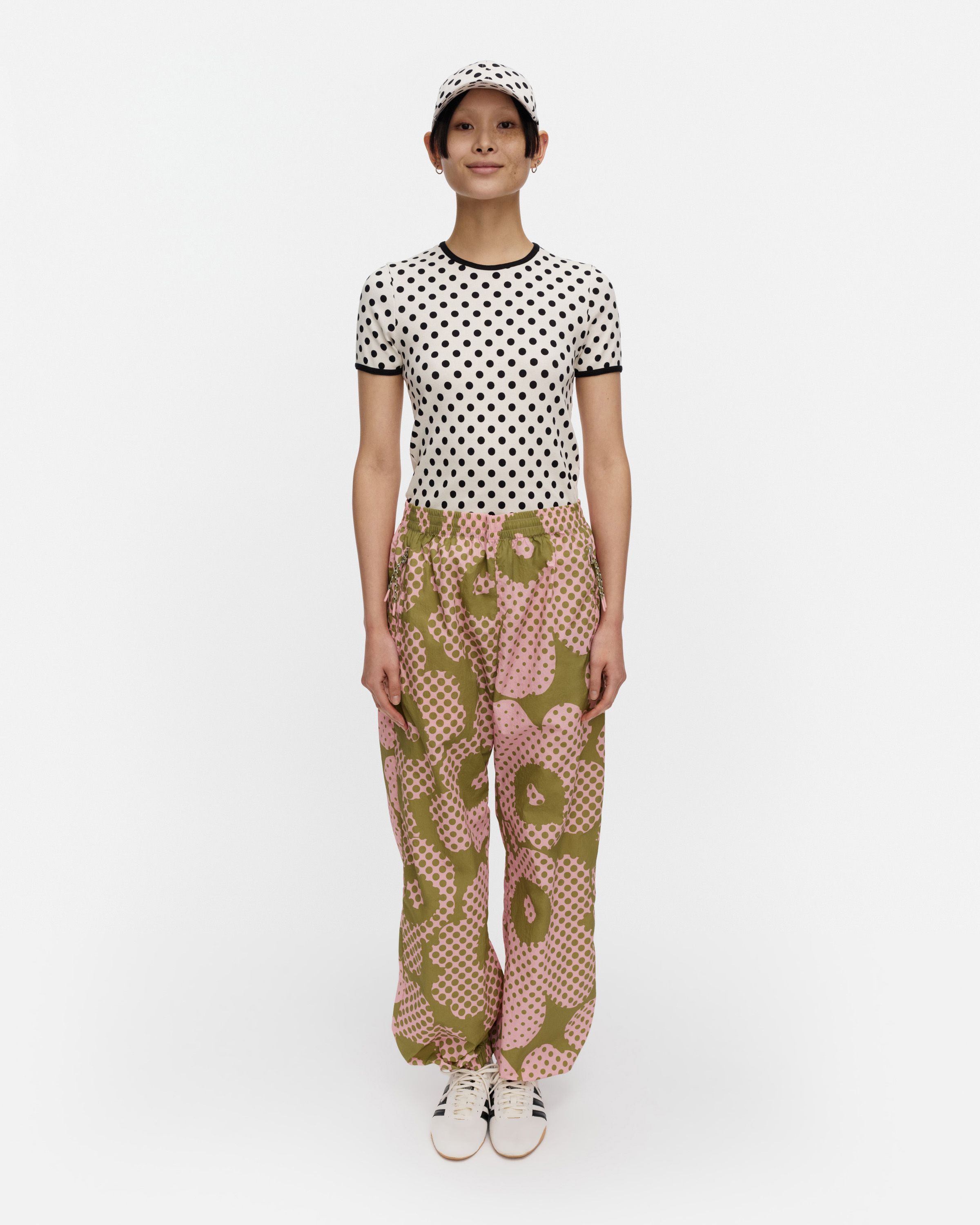 Olos Unikko Kioski activewear trousers green, light pink | Marimekko