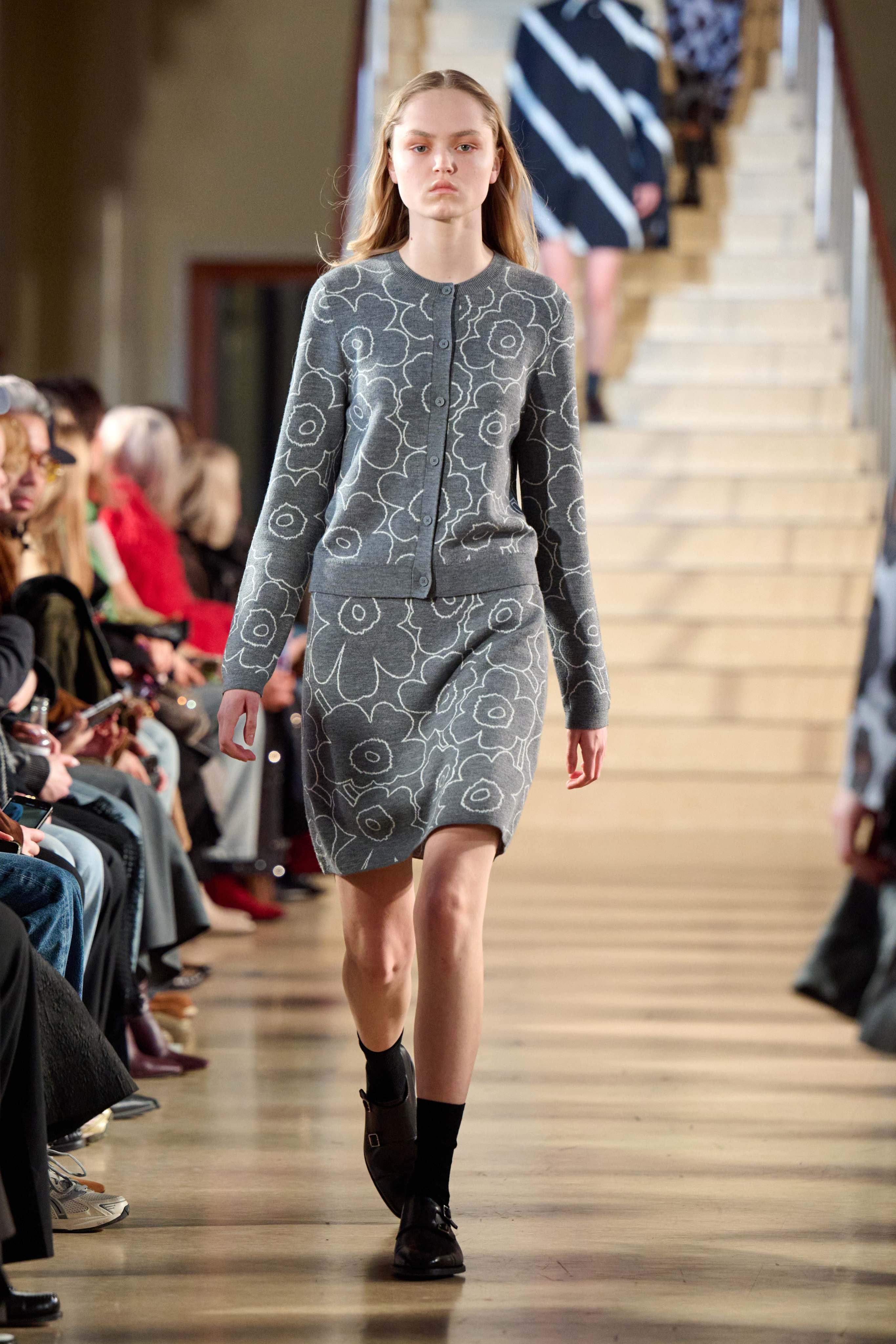 A model walking in Marimekko's fashion show