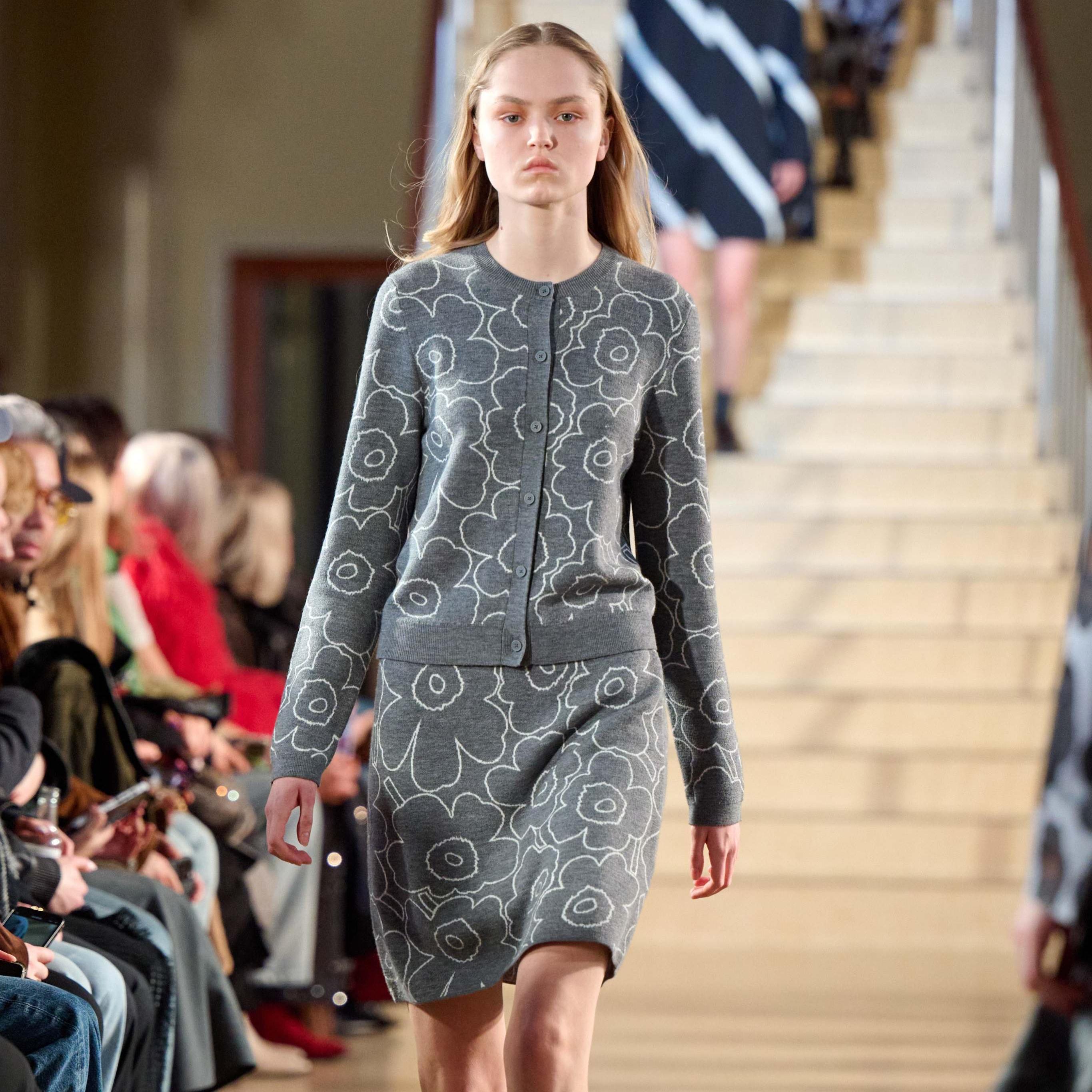 A model walking in Marimekko's fashion show