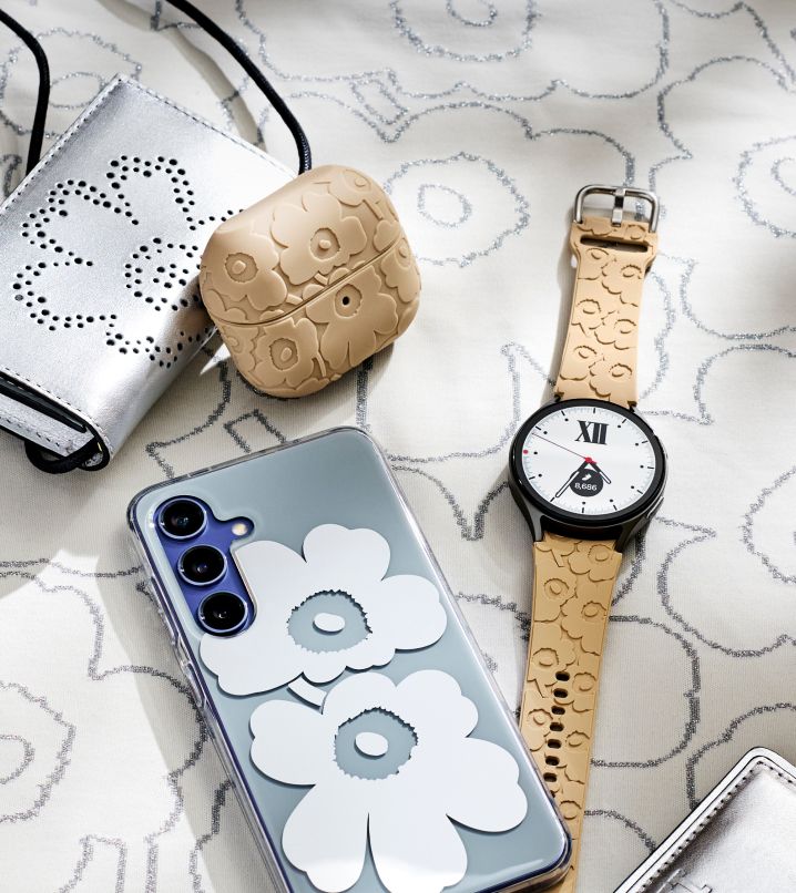 Samsung and Marimekko collaboration grey and white phone cover in Unikko pattern, iPod cover in beige Unikko pattern and watch wrist in beige Unikko pattern