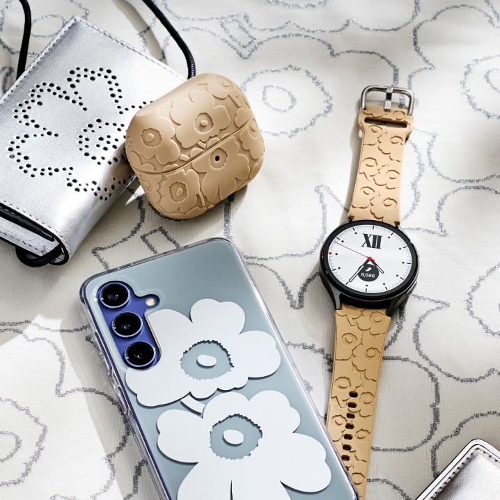 Samsung and Marimekko collaboration grey and white phone cover in Unikko pattern, iPod cover in beige Unikko pattern and watch wrist in beige Unikko pattern