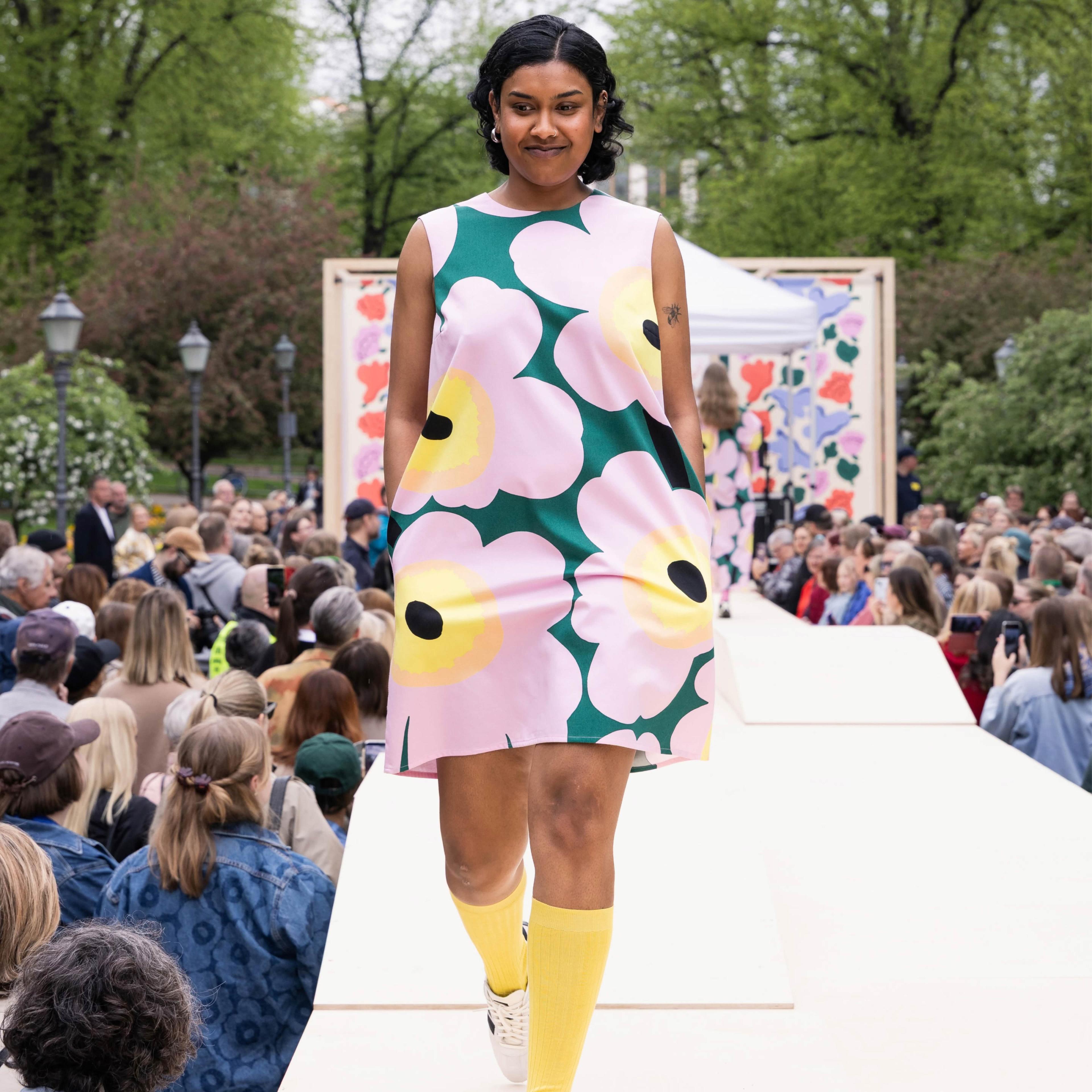 The Marimekko Day model walks on stage