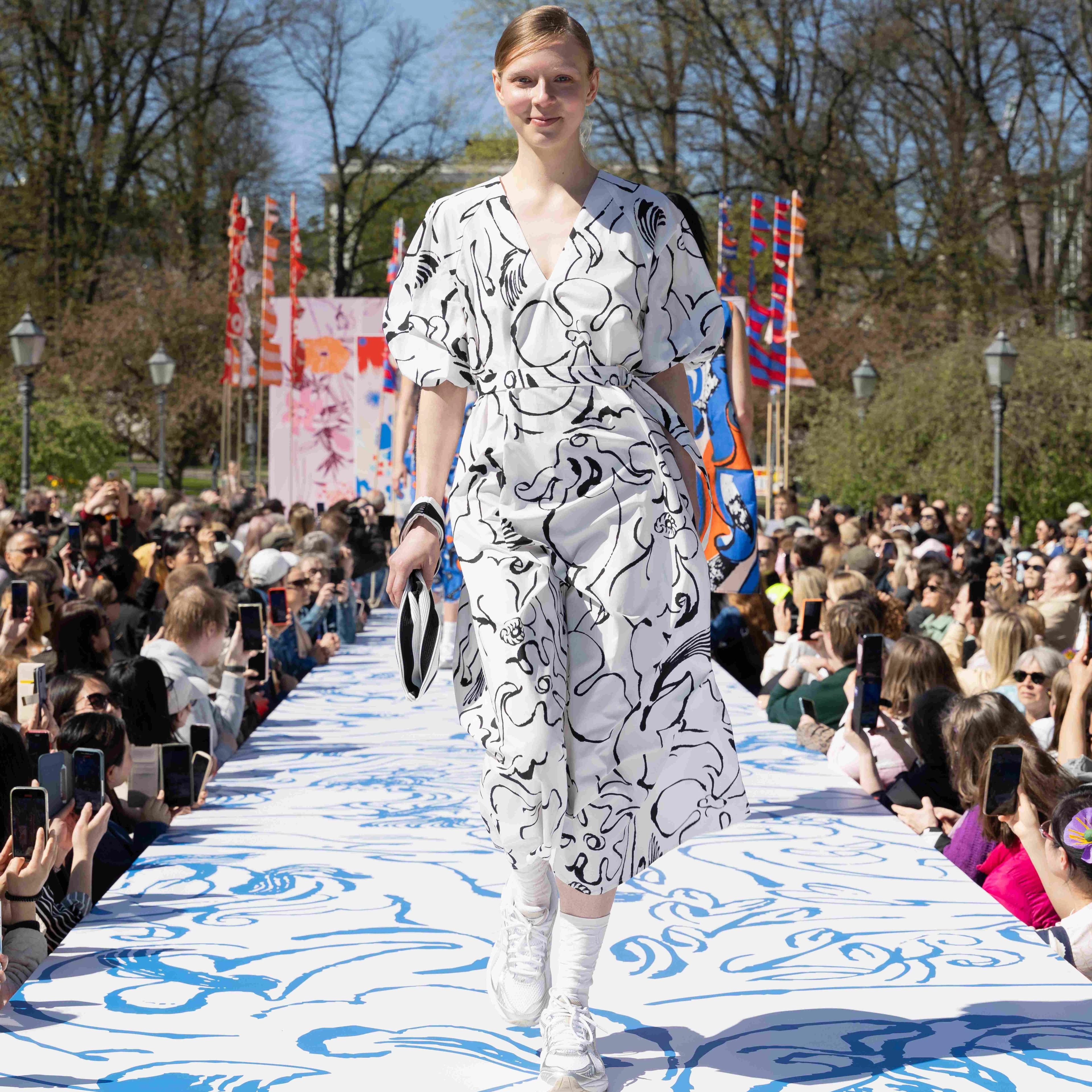 Model wearing Kimppu dress in Baluns print.