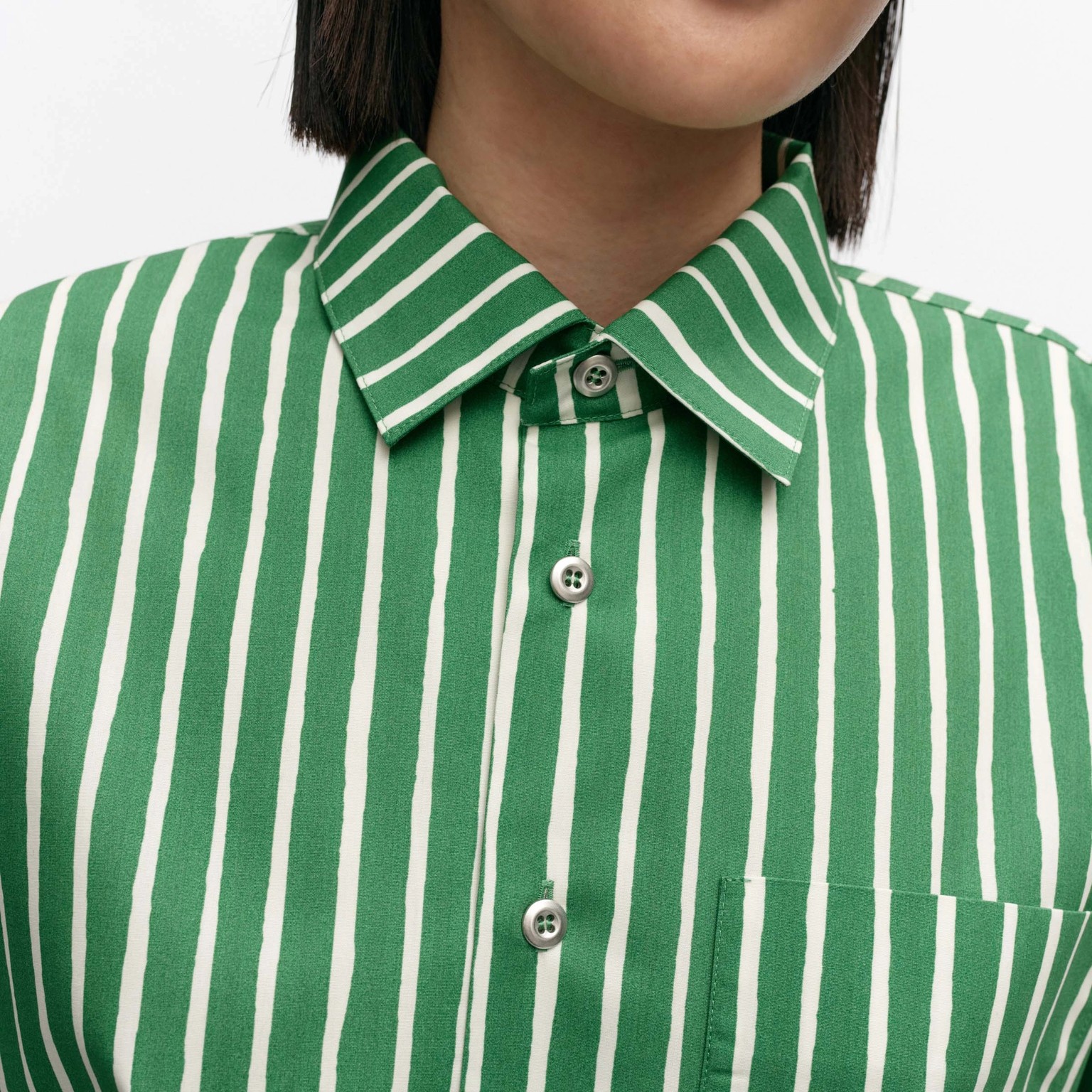 Model wearing Jokapoika shirt.