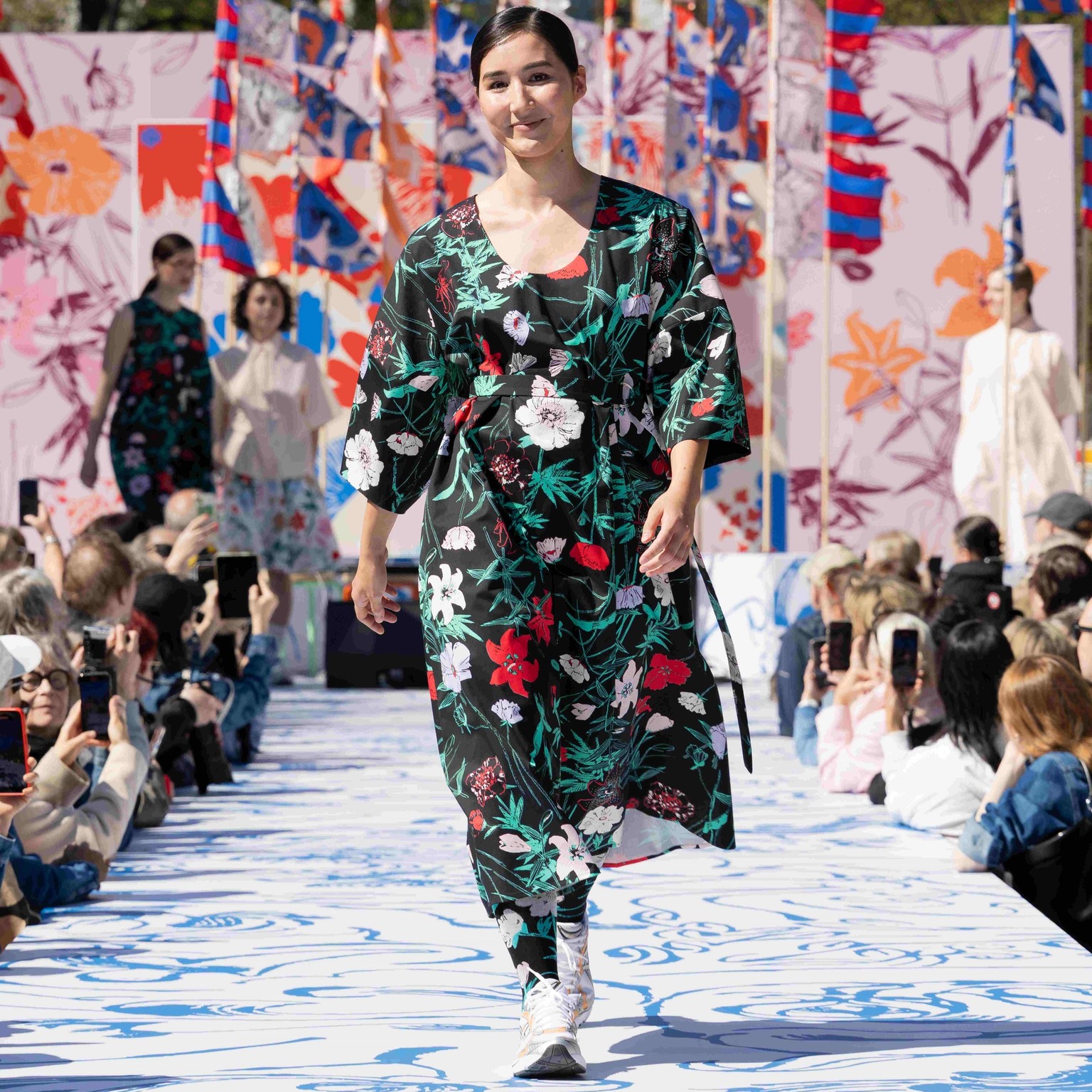 Model wearing Kimppu dress in Perenna print.