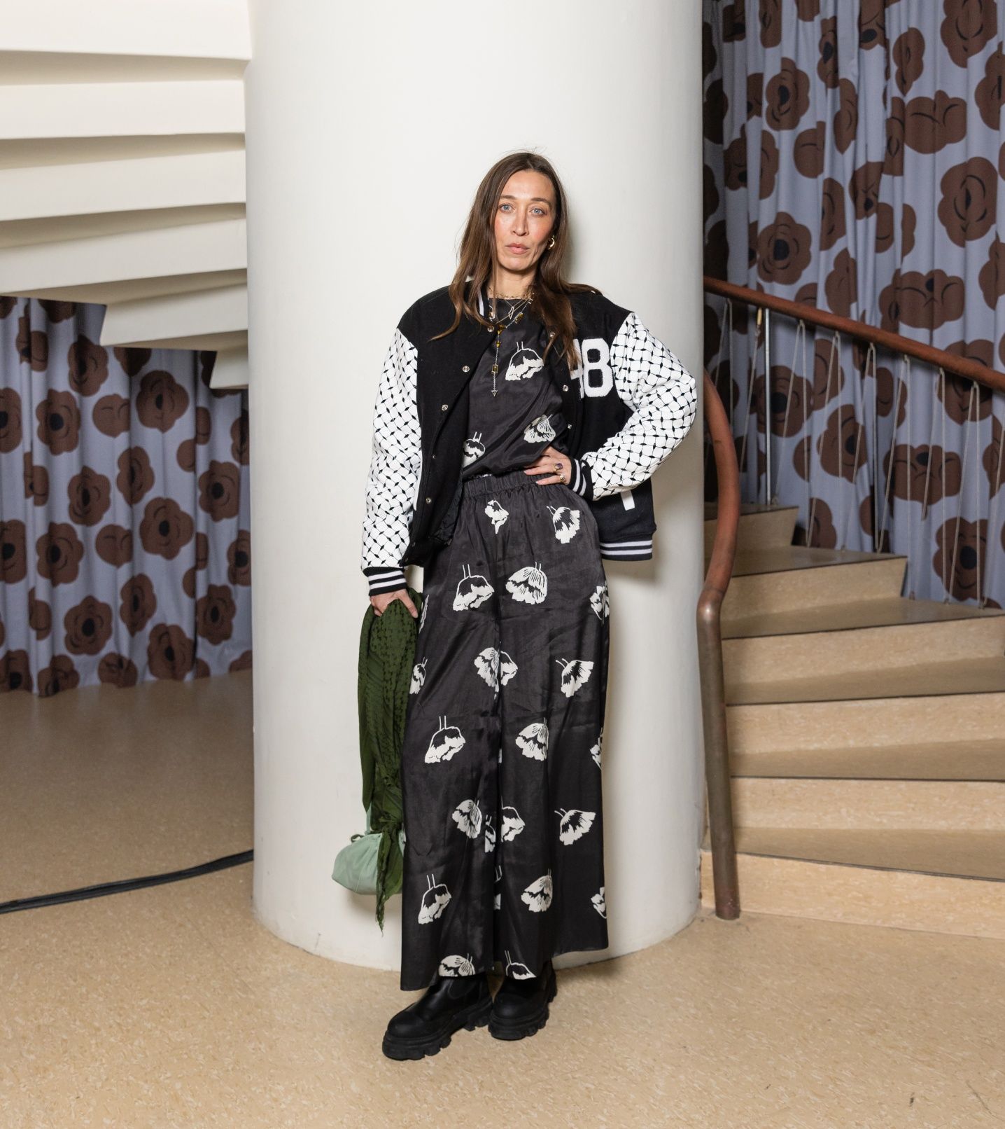 Alana Hadidin in black and white Marimekko shirt and trousers in Myski pattern