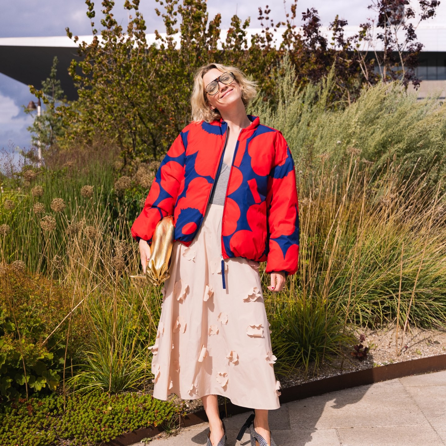 Pernille Rosenkilde wearing Marimekko jacket in Unikko pattern and light pink skirt