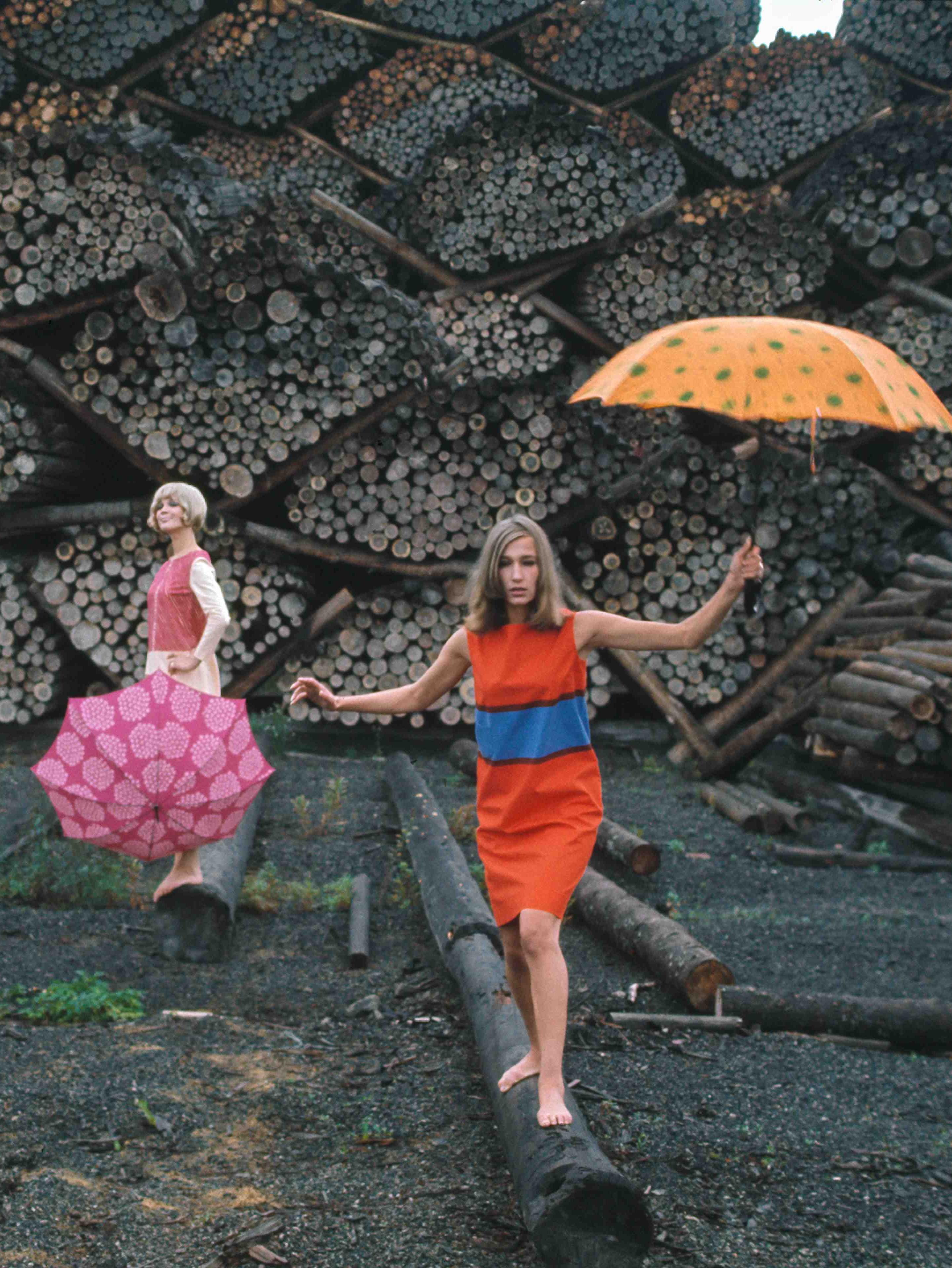 Models wearing vintage Marimekko Marimini in the rain.