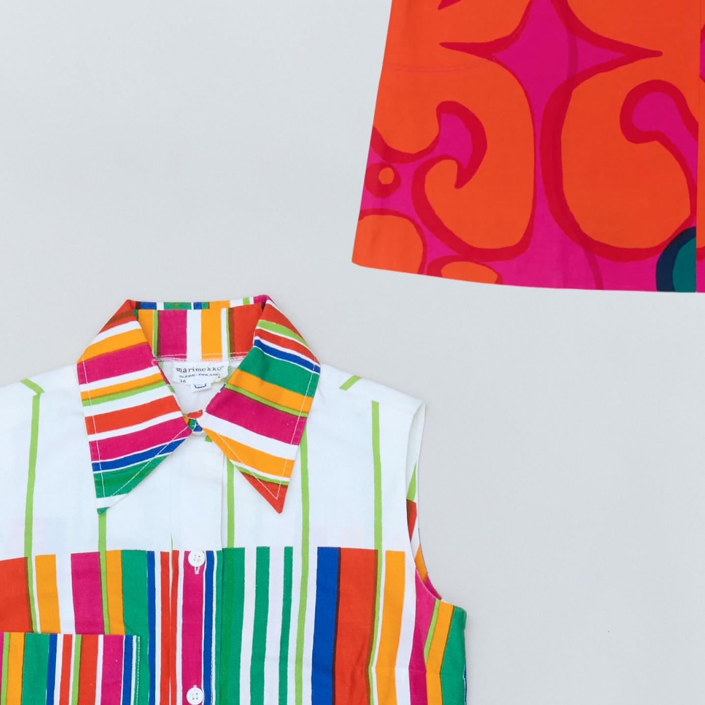 An image where you can see a hem of a dress in red and orange Keidas print and top of a dress in multi coloured Kirjo print.