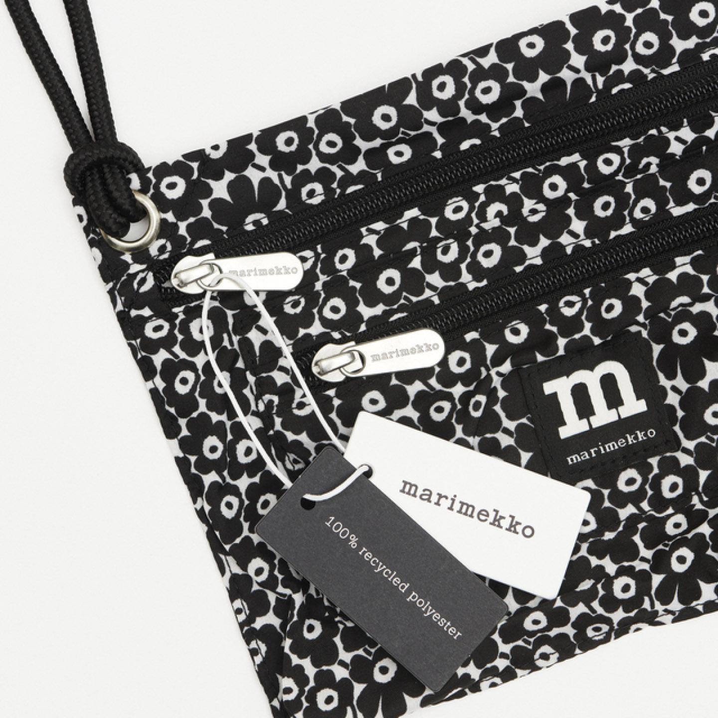 Black and white Unikko pattern in bag with tags on