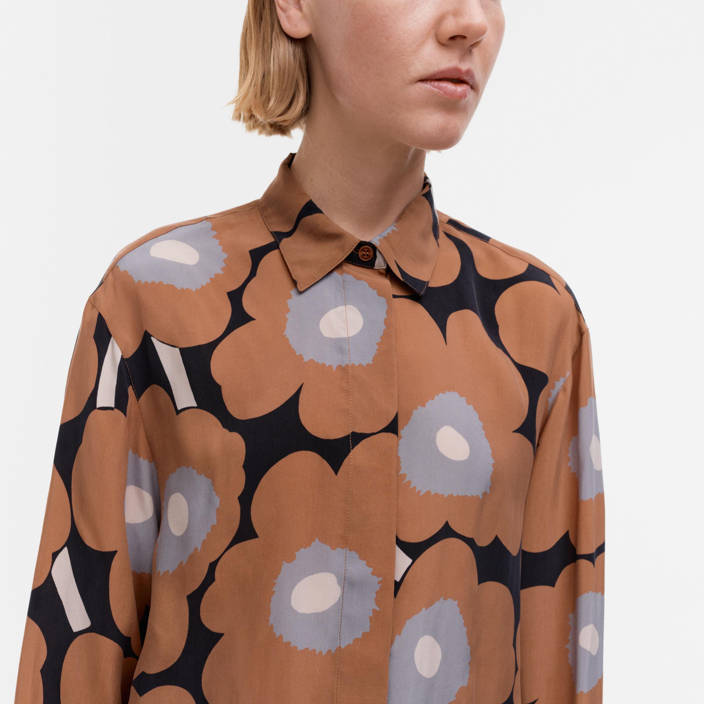 Mallin päällä: Unikko paita