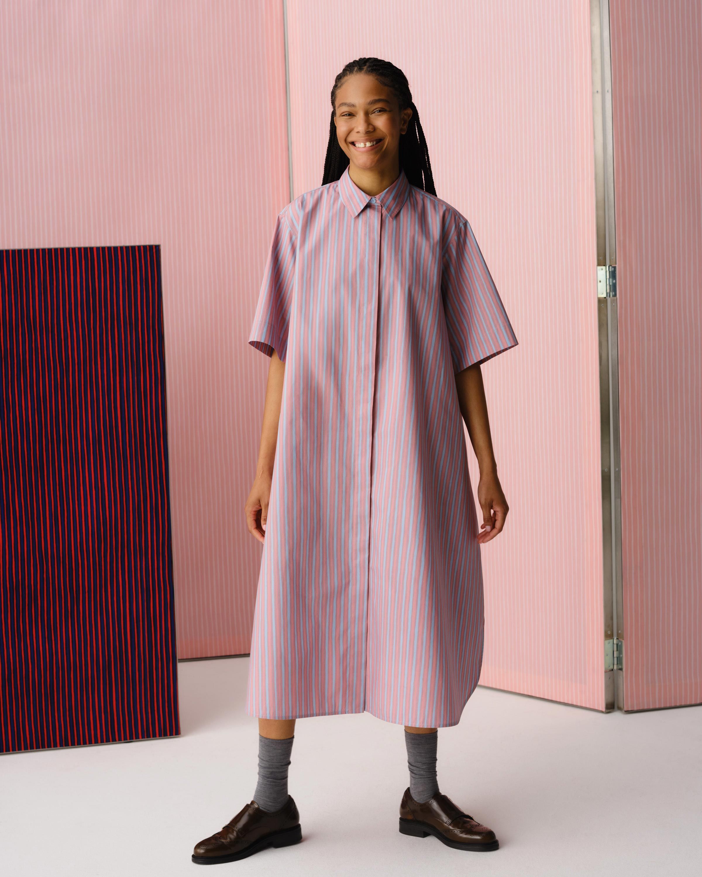 Model wearing Paperi dress in Piccolo print.