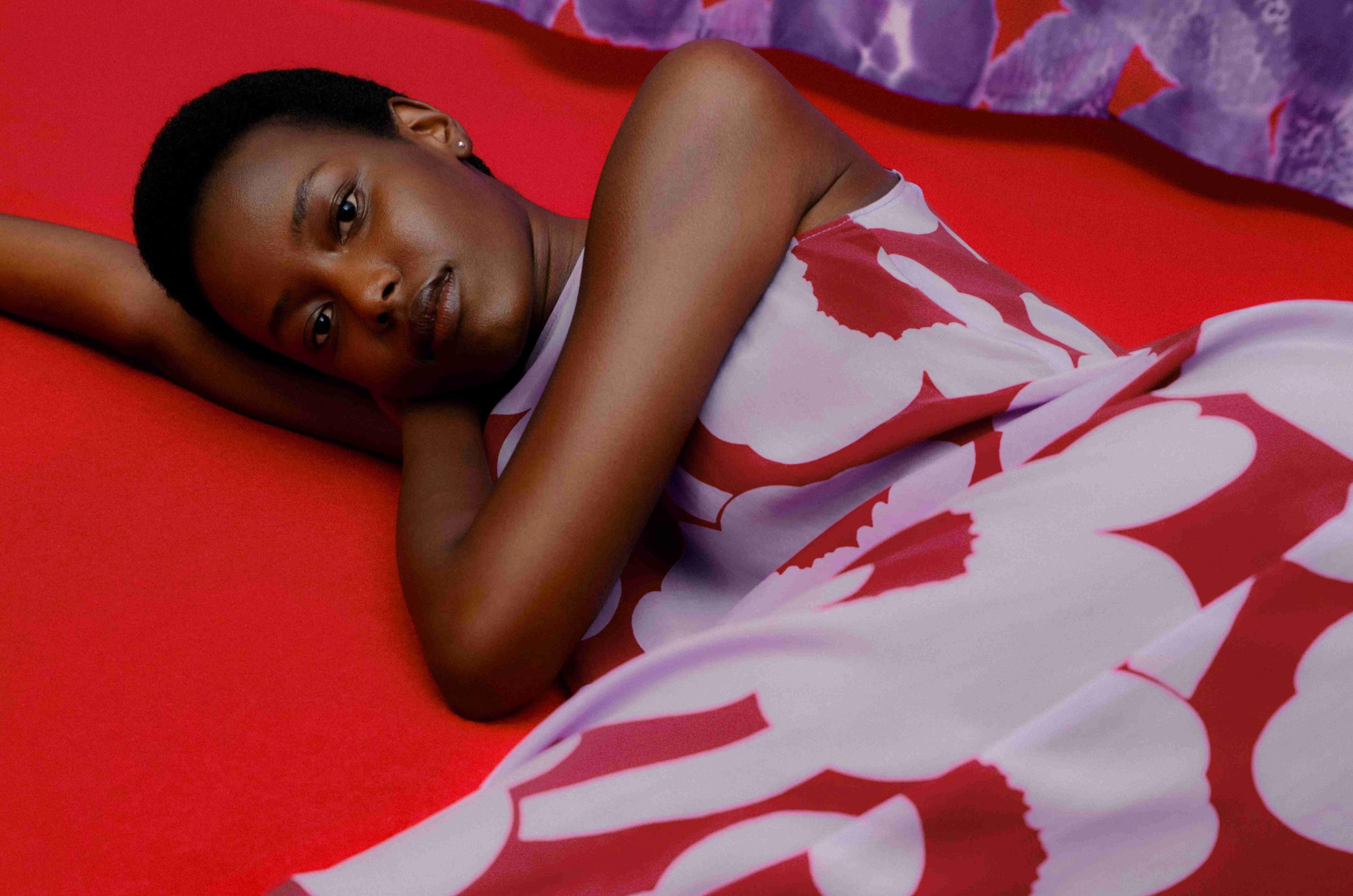 Model wearing Migot dress in Unikko print.