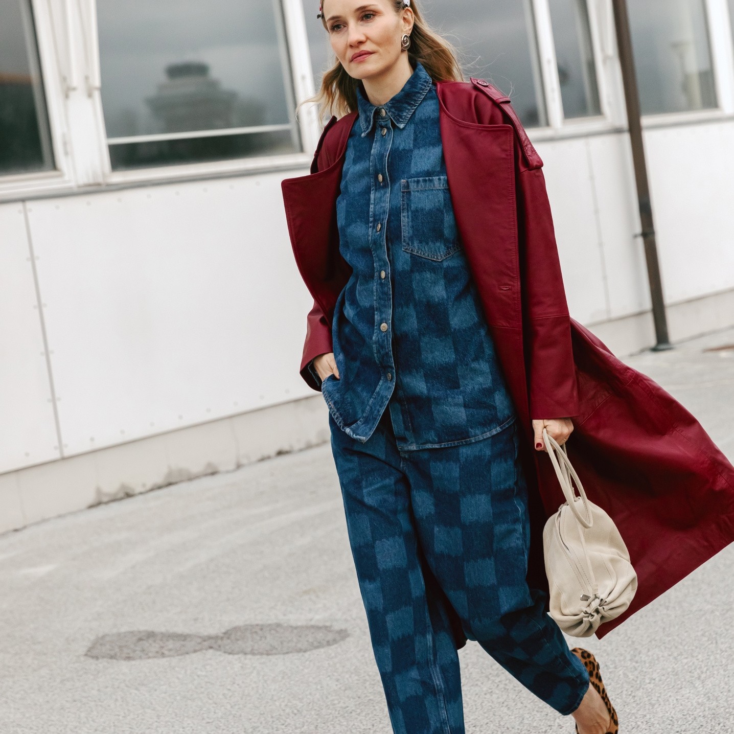 Hanni Gohr dressed in a checkered denim outfit by Marimekko.