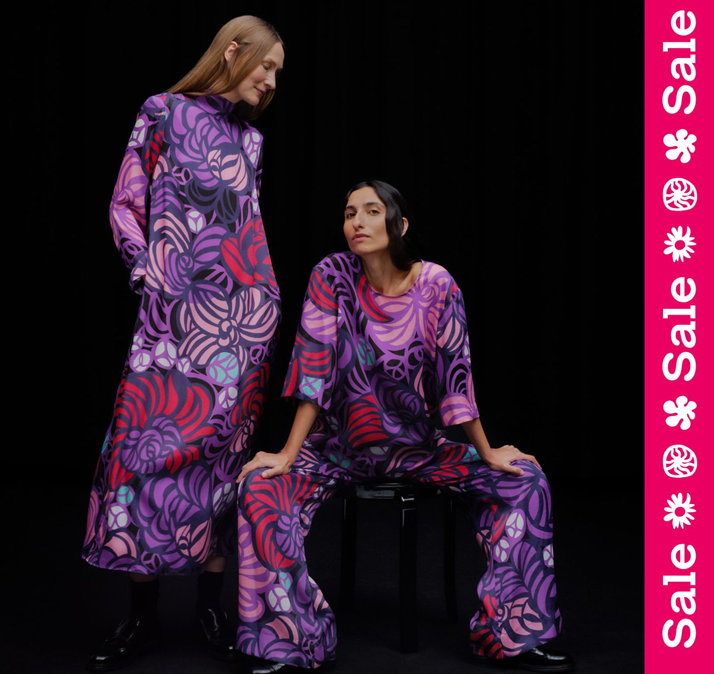 Two women wearing Torstai prints, one seated and one standing, with a “Sale” text overlay.