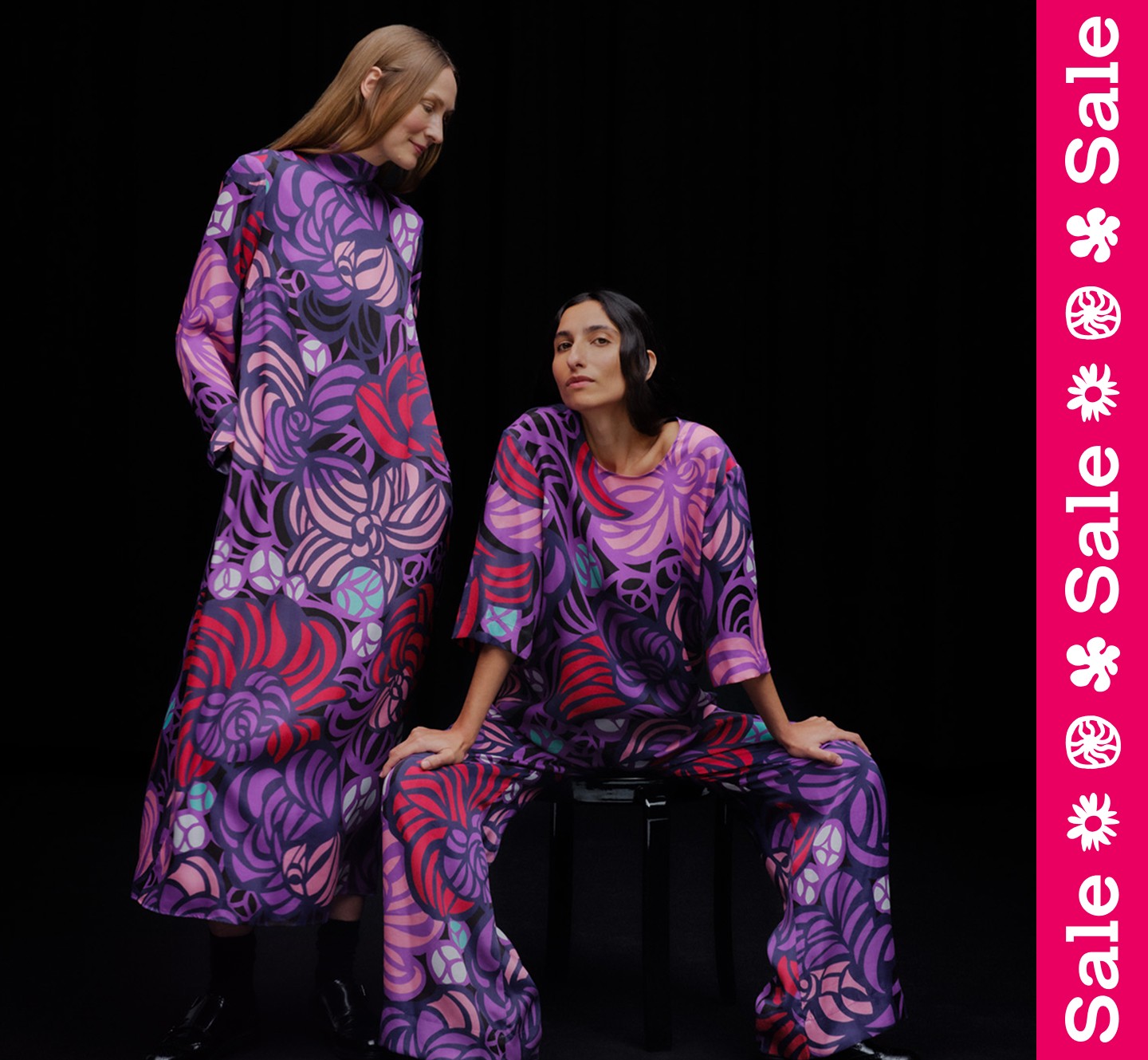 Two women wearing Torstai prints, one seated and one standing, with a “Sale” text overlay.