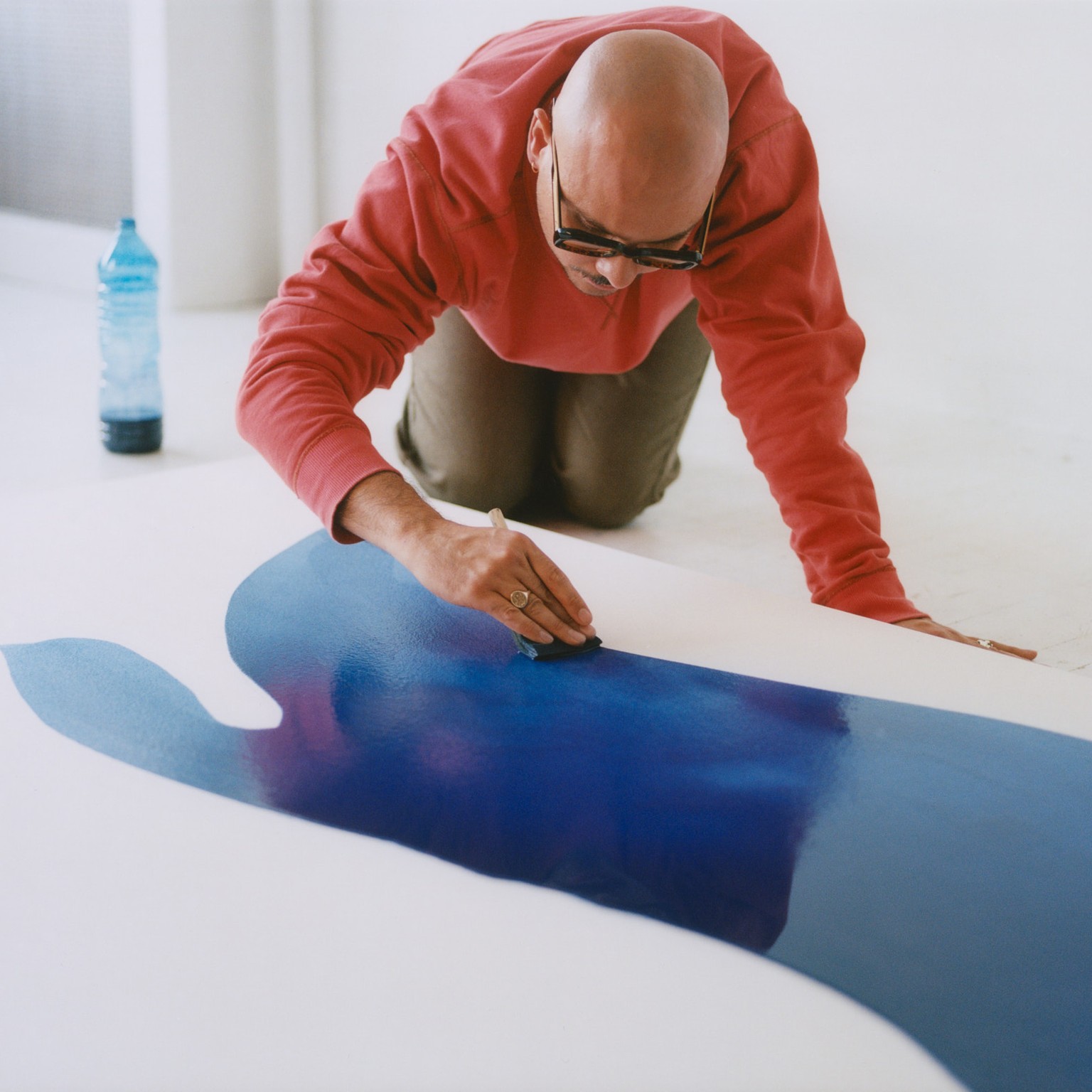 Landon Metz is painting.