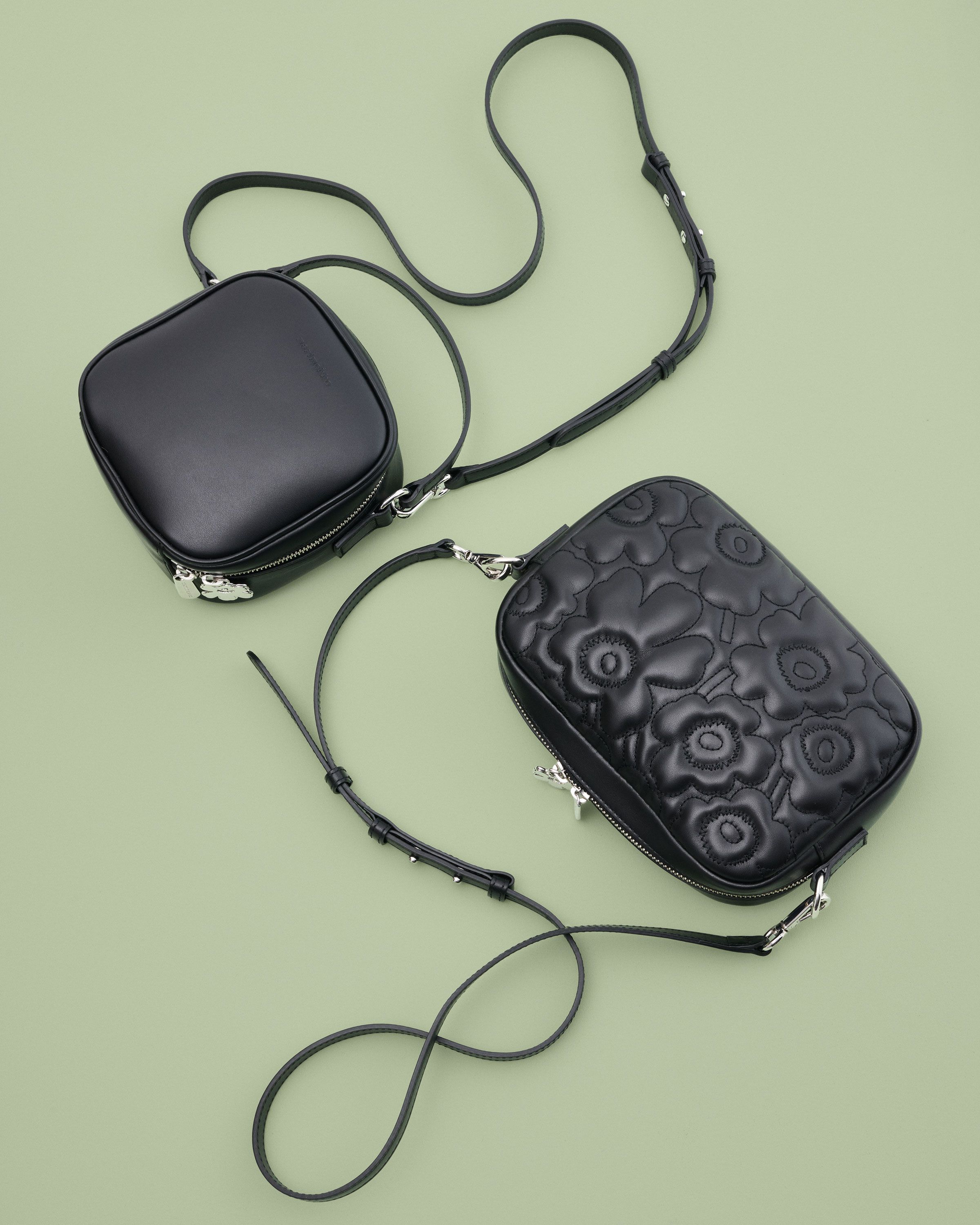 Two Gratha bags in black one with Unikko print and one without.