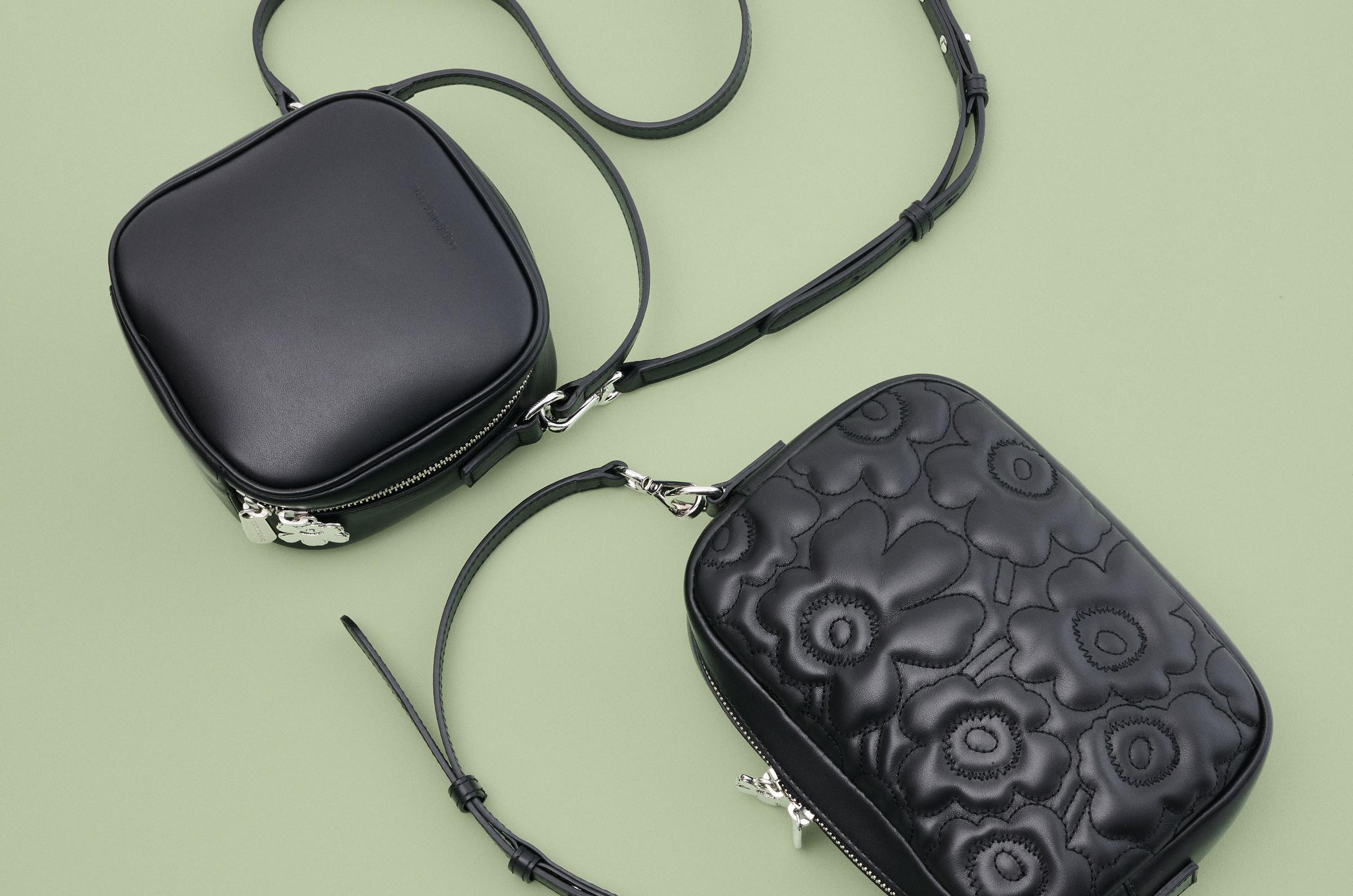 Two Gratha bags in black one with Unikko print and one without.