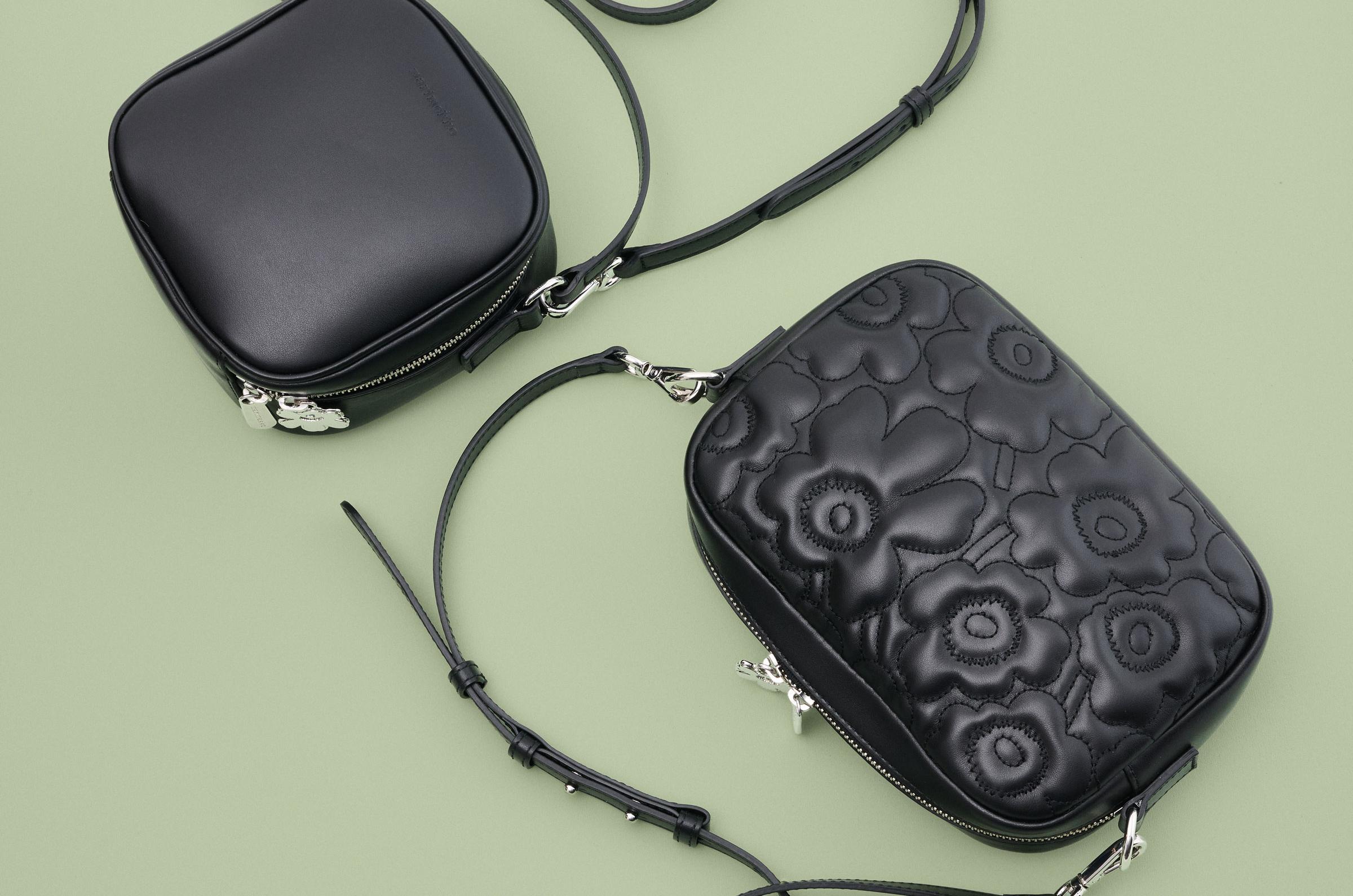 Two Gratha bags in black one with Unikko print and one without.
