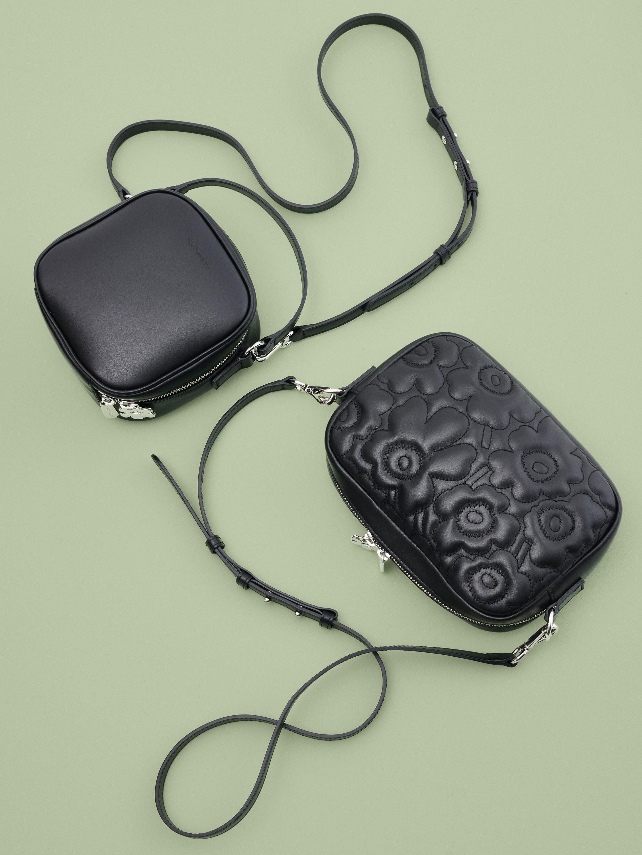 Two Gratha bags in black one with Unikko print and one without.