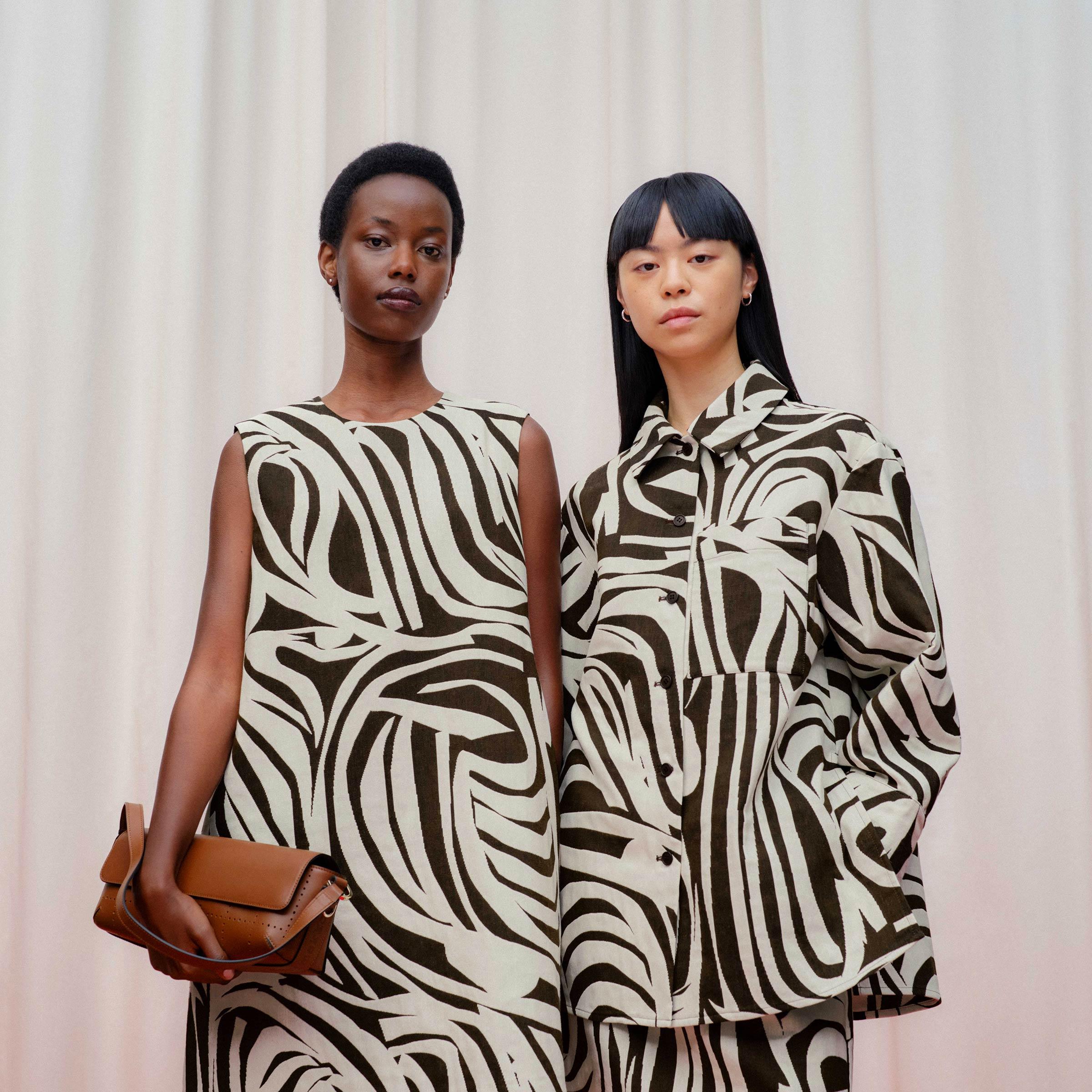 Models wearing dresses in Jokuraita pattern.