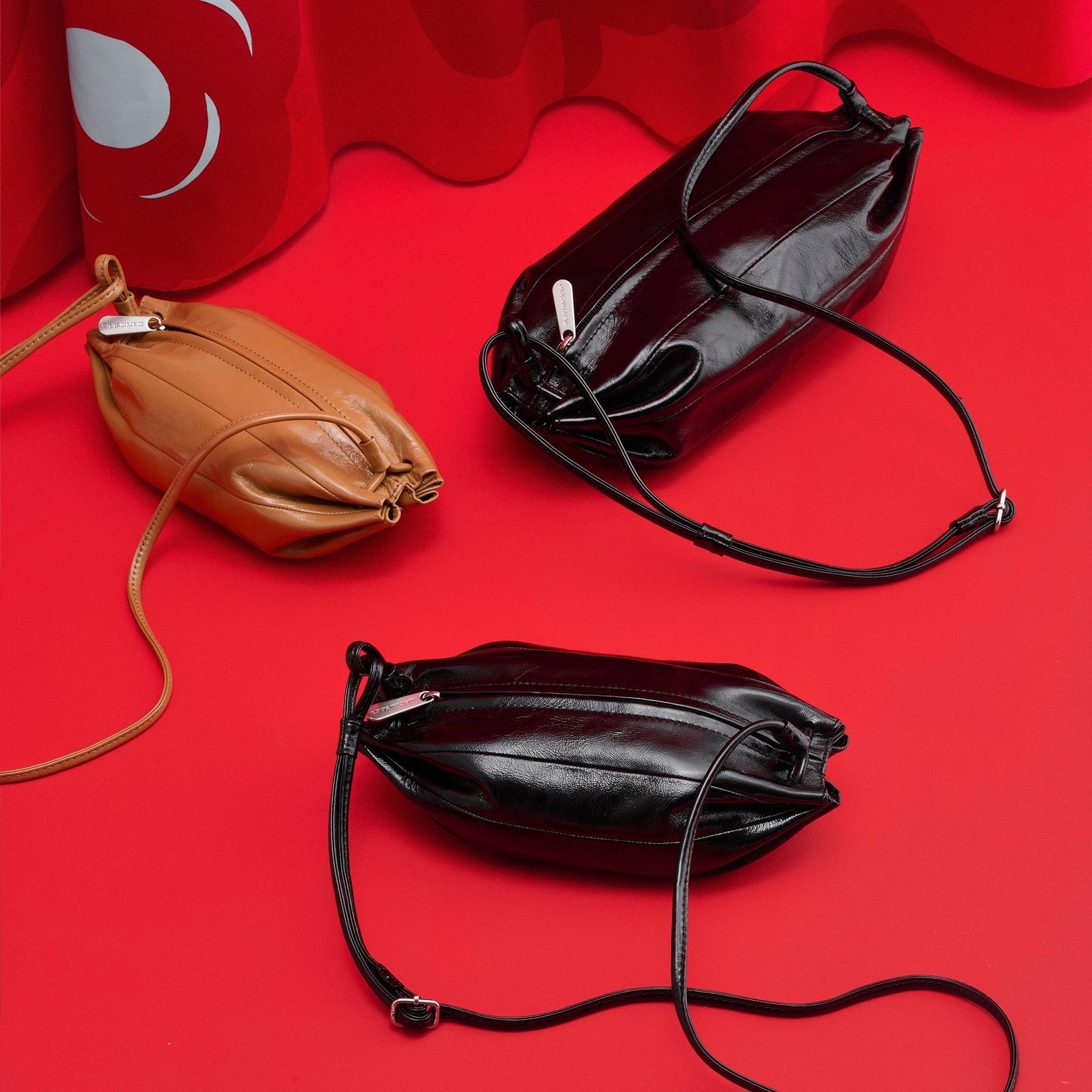 Karla bags placed on a red carpet.