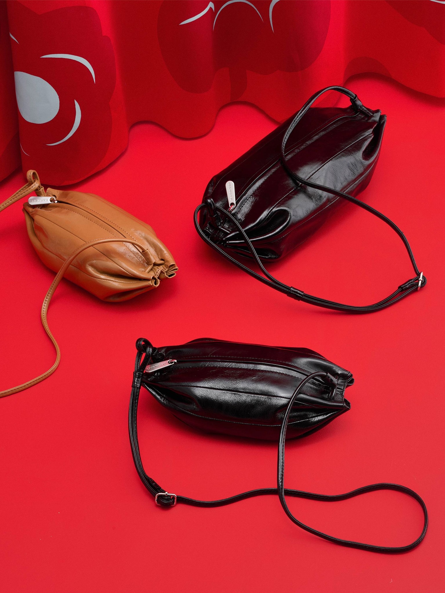 Karla bags placed on a red carpet.