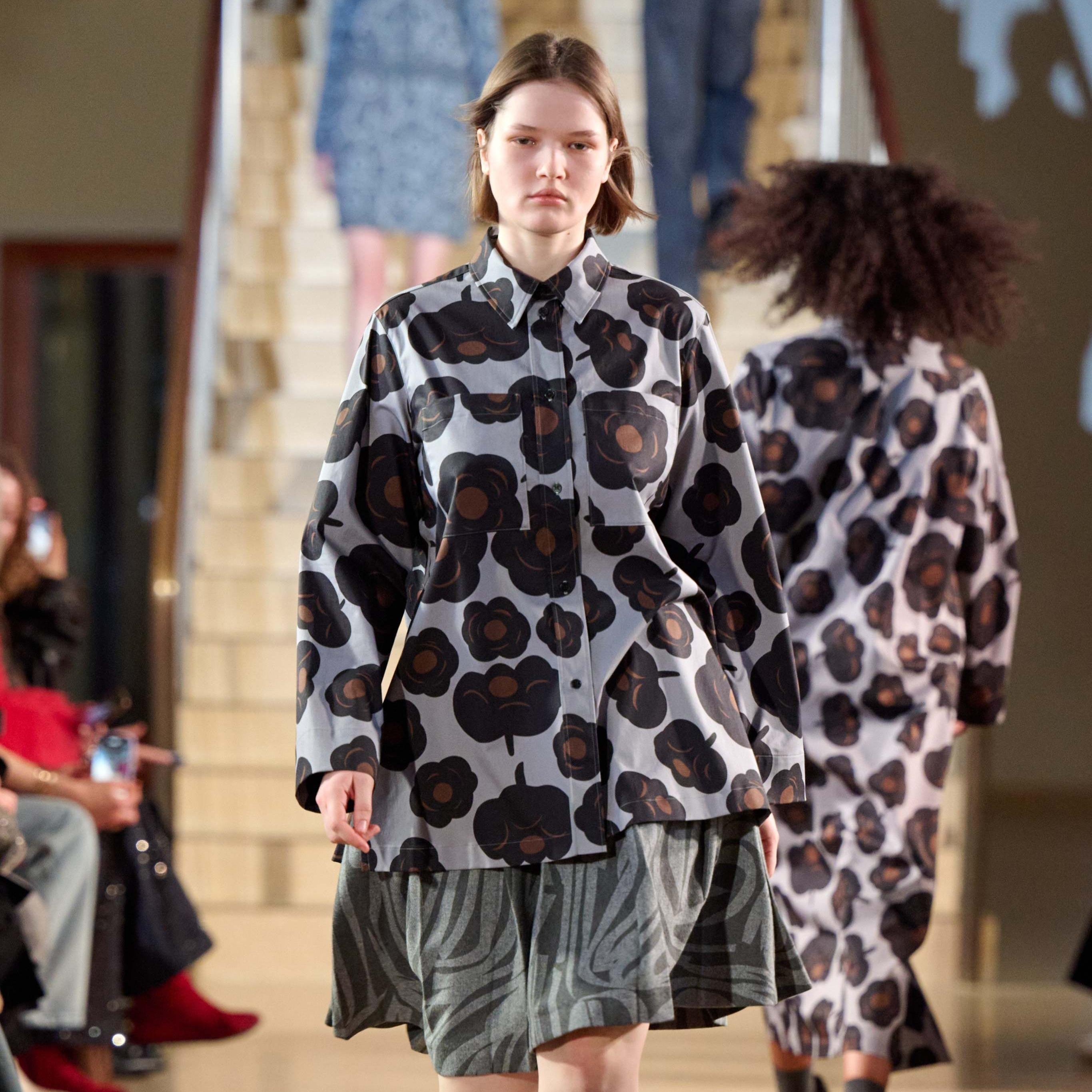 A model walking in Marimekko's fashion show
