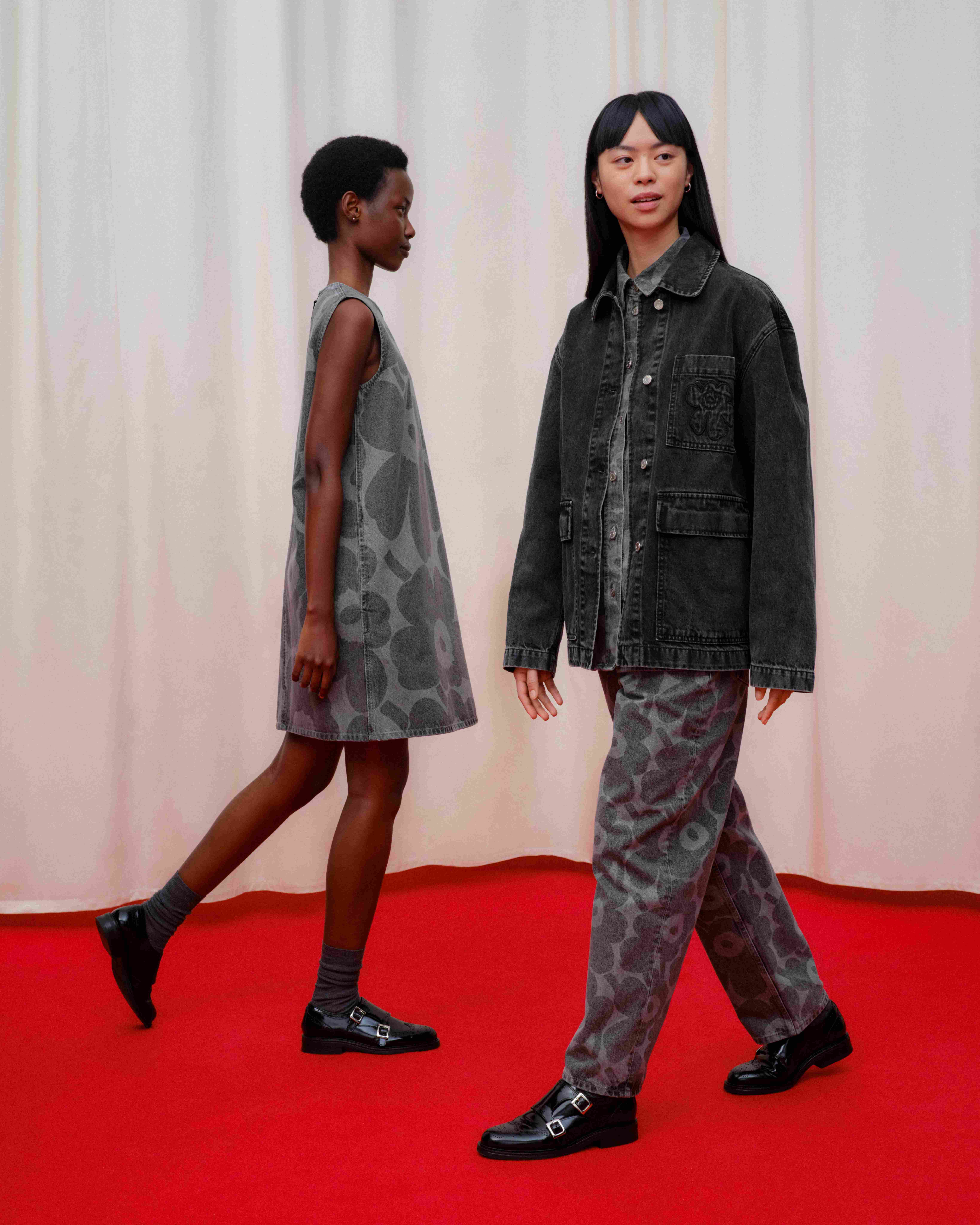Models walking in full Maridenim looks in grey Unikko print.