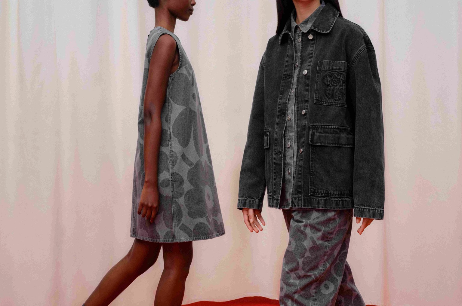 Models walking in full Maridenim looks in grey Unikko print.