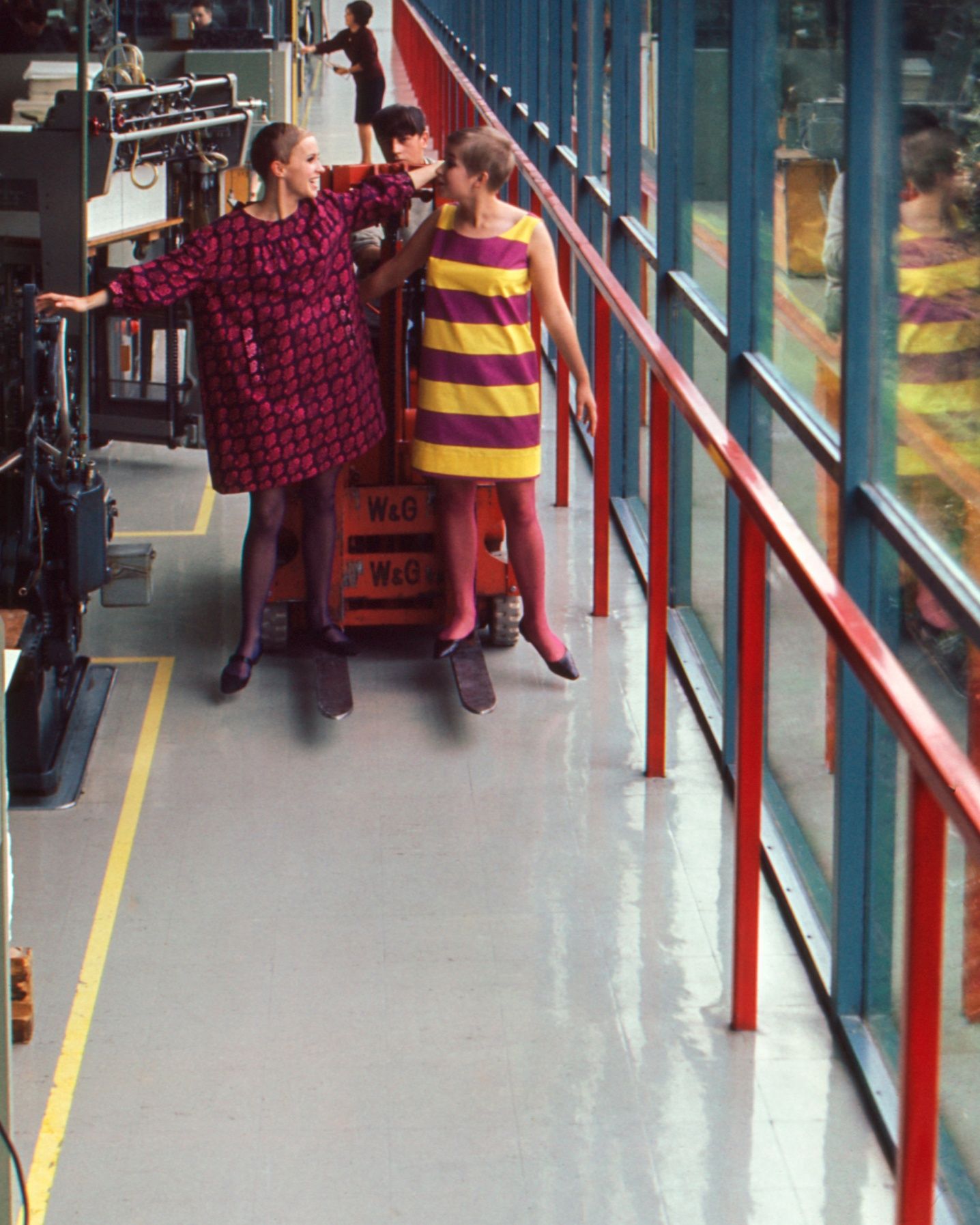 Models wearing vintage Marimekko Marimini in Marimekko's printing mill. 