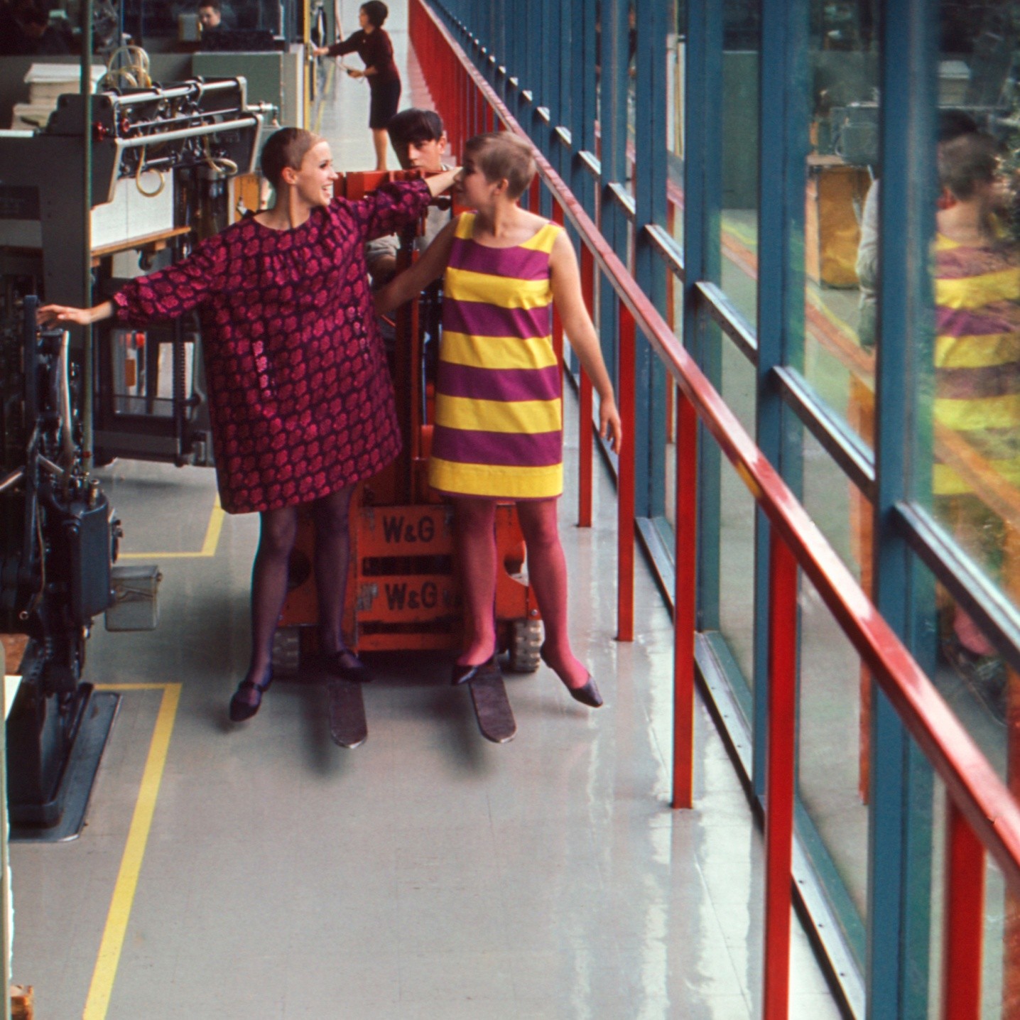 Models wearing vintage Marimekko Marimini in Marimekko's printing mill.