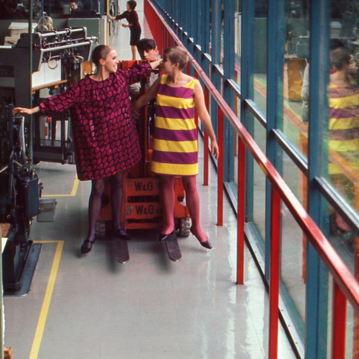 Models wearing vintage Marimekko Marimini in Marimekko's printing mill.