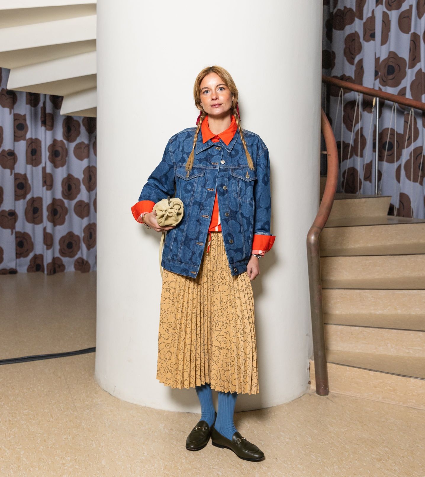 Mafalda Patricion wearing Maridenim jeans jacket with Unikko pattern and yellow Myy skirt with Unikko pattern
