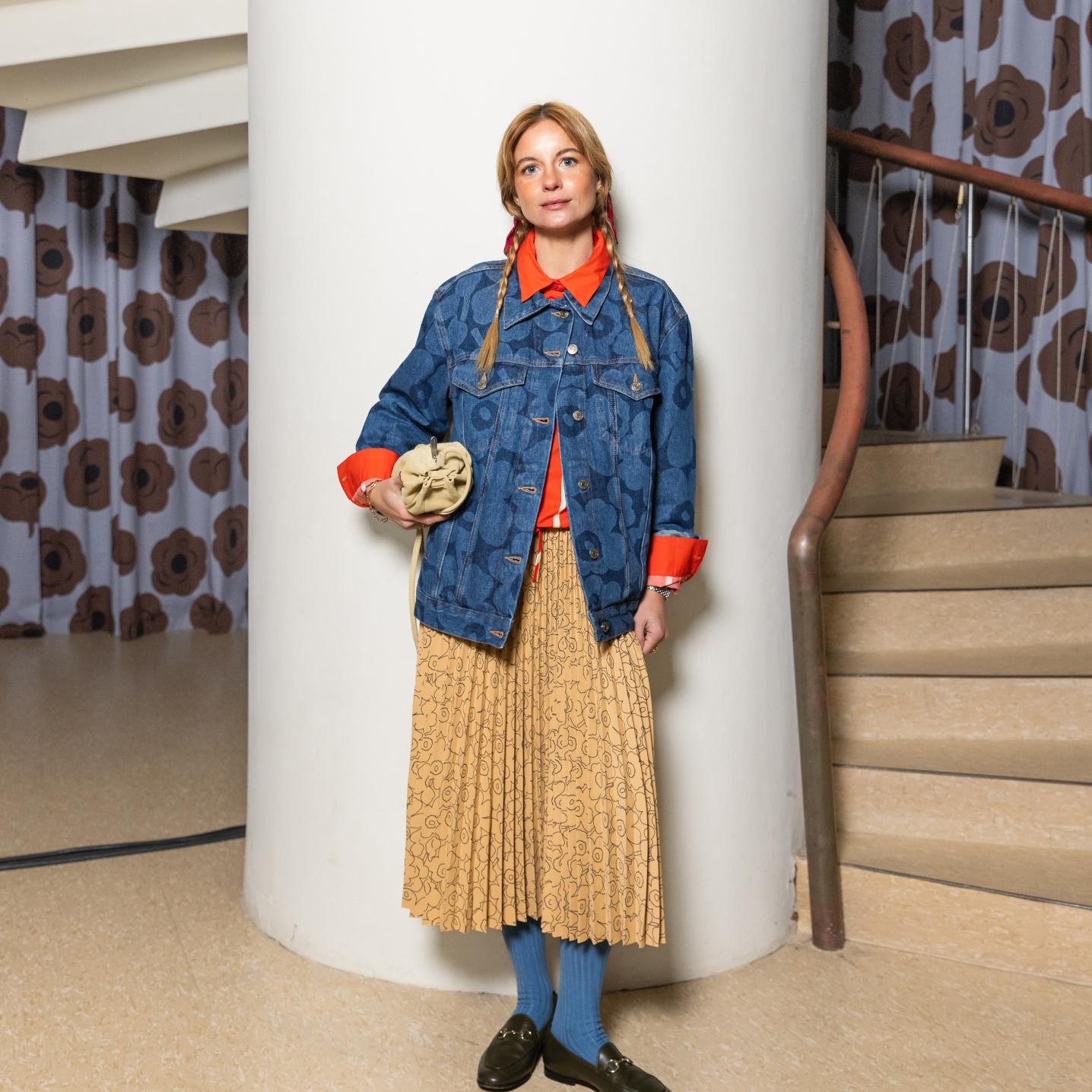 Mafalda Patricion wearing Maridenim jeans jacket with Unikko pattern and yellow Myy skirt with Unikko pattern
