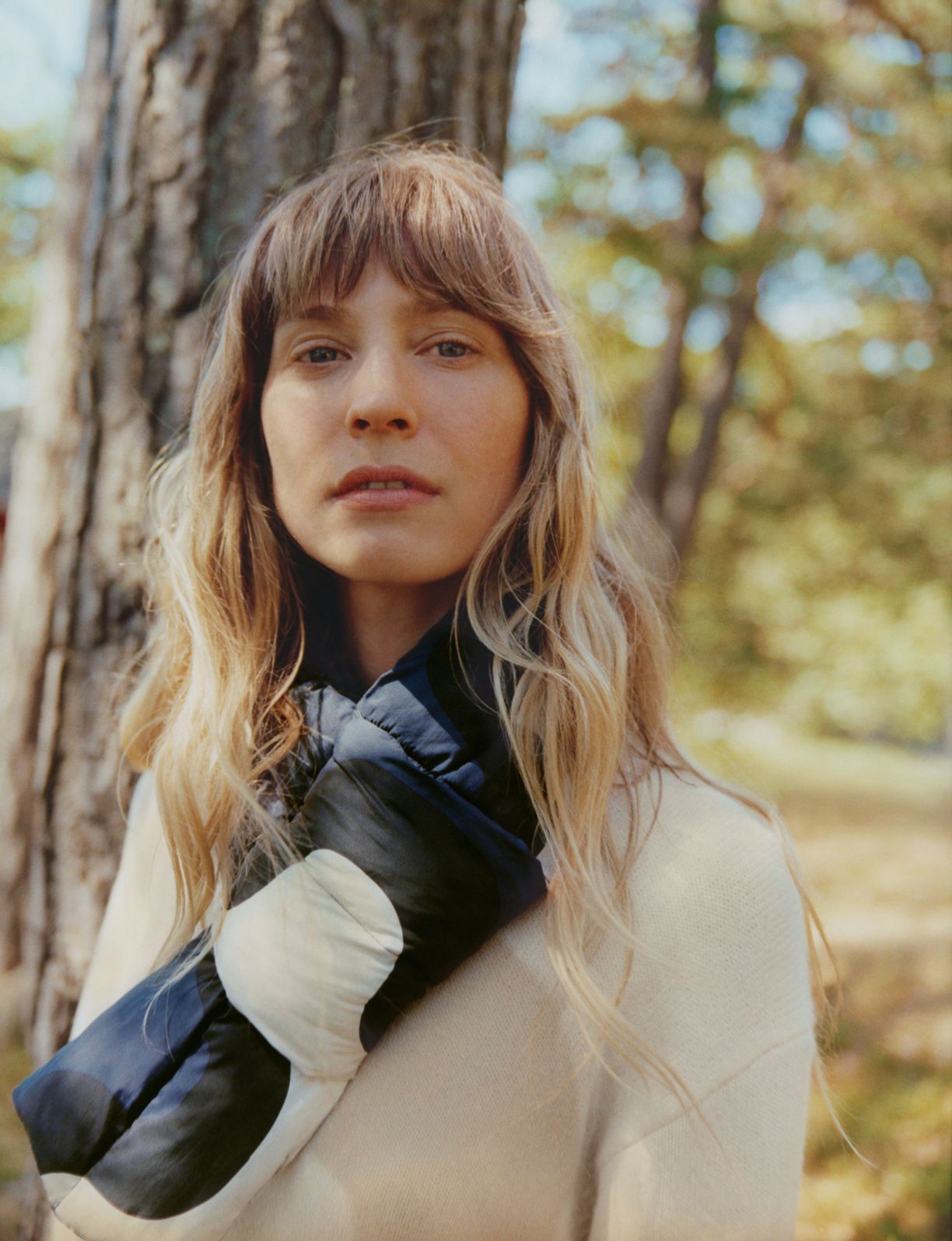 Model in the forest wearing Uniqlo and Marimekko collaboration clothing