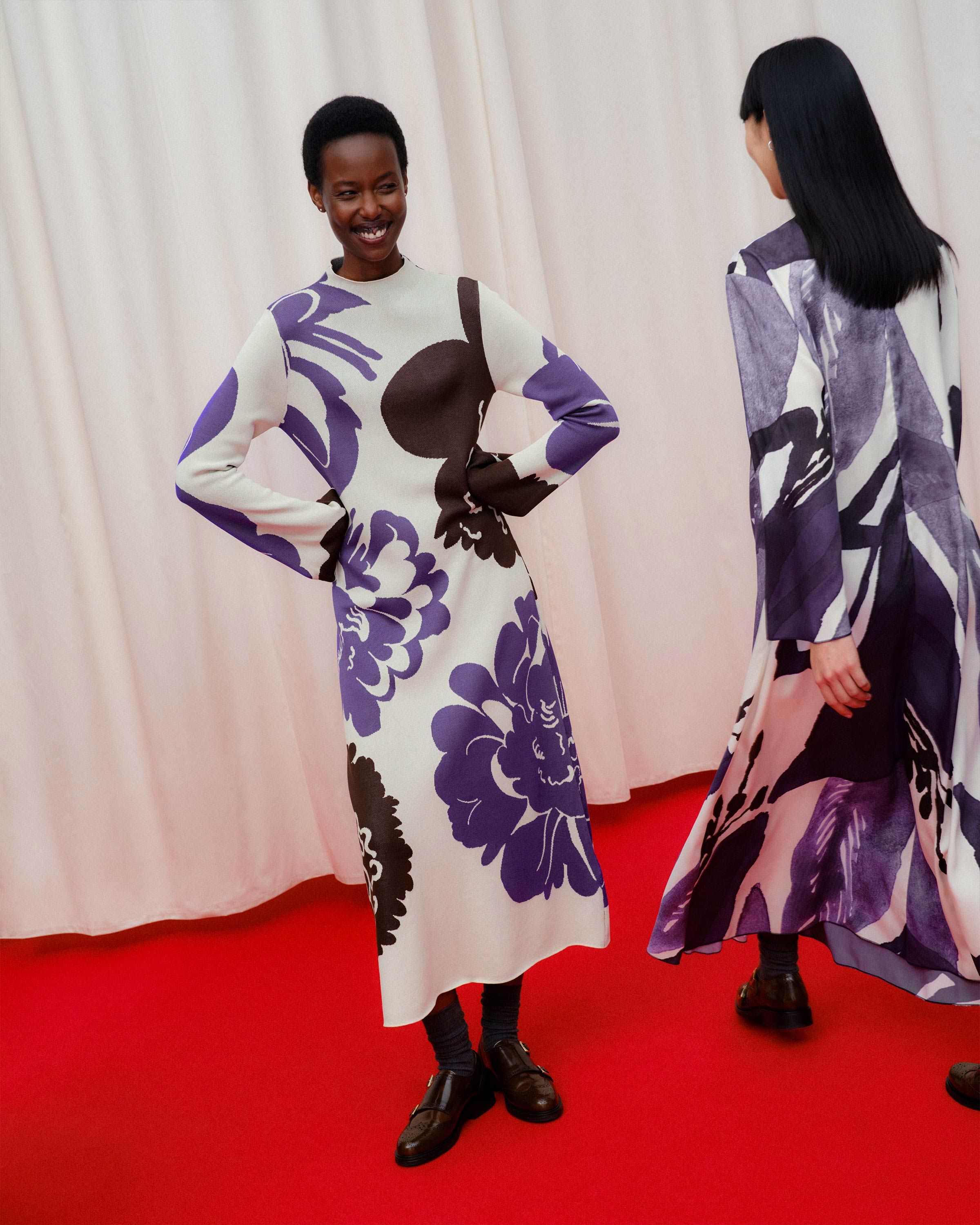 Models wearing dresses in Kylmänkukka and Pioni pattern.