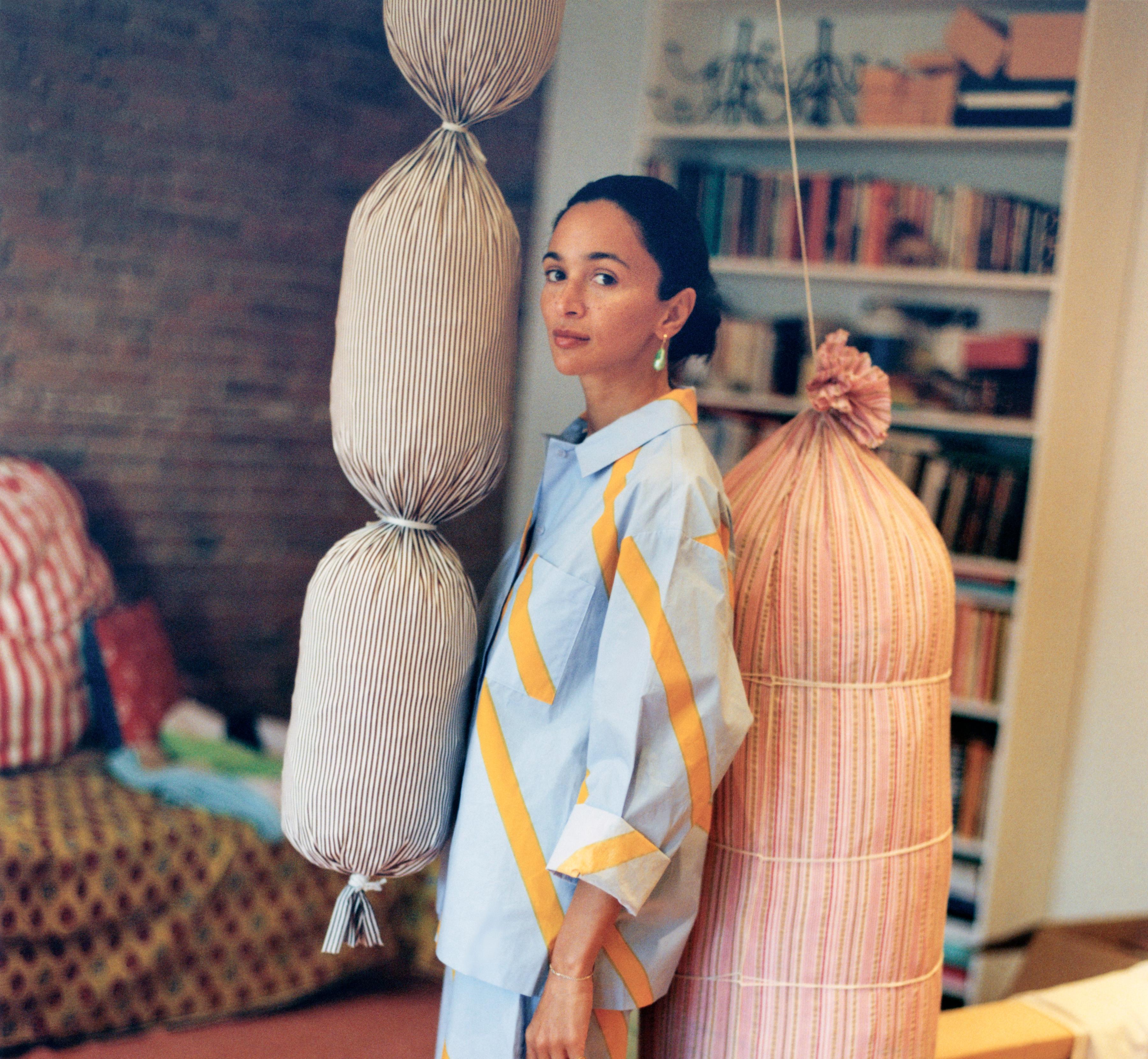 Laila Gohar wearing the Marimekko collaboration shirt and trousers in blue.