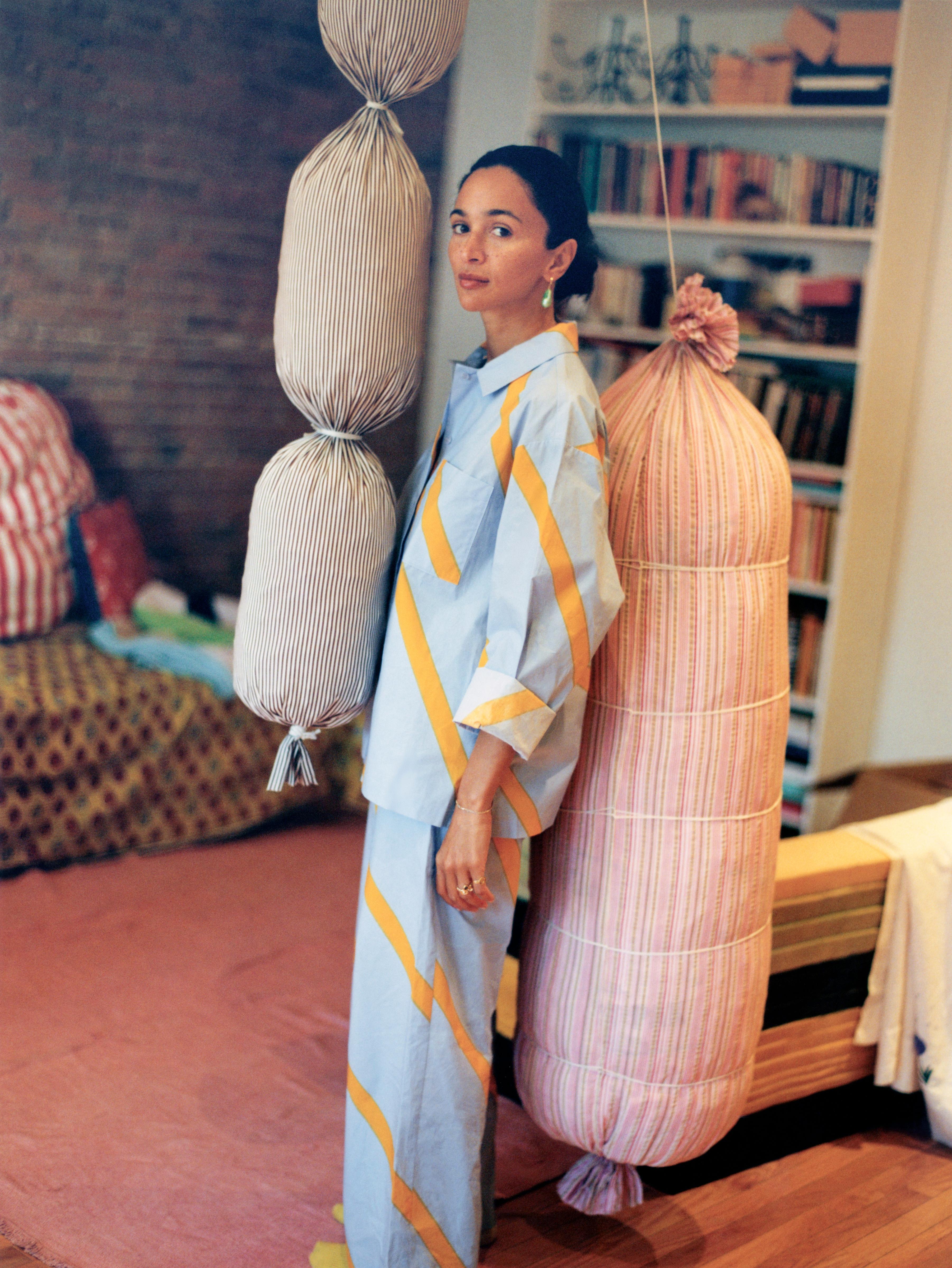 Laila Gohar wearing the Marimekko collaboration shirt and trousers in blue.