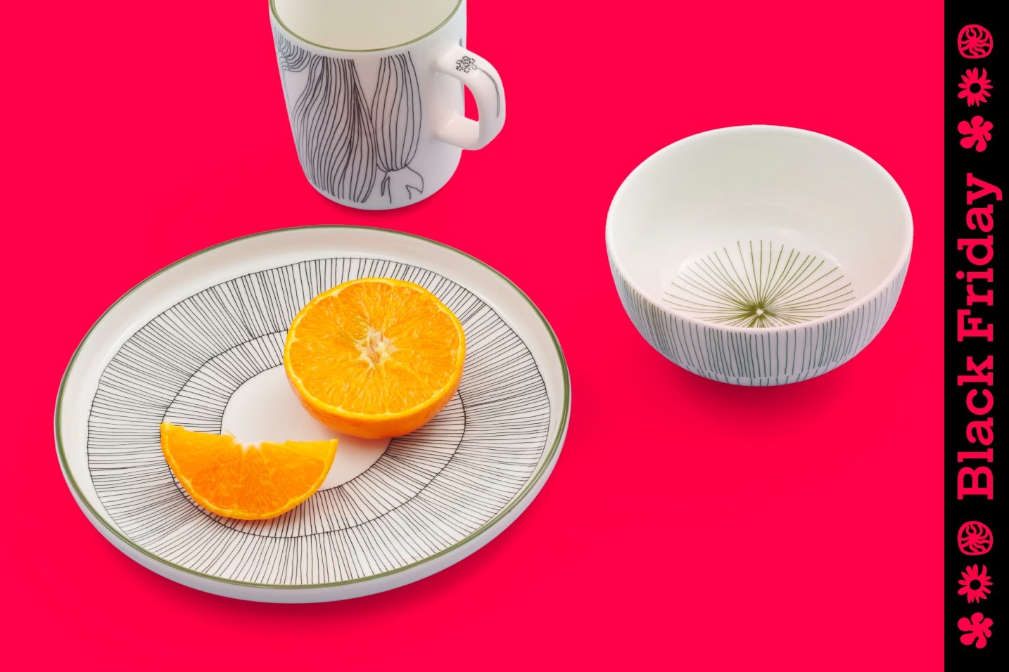 Oiva tableware in Kukat Puhkeavat pattern on a red background and Black Friday text.